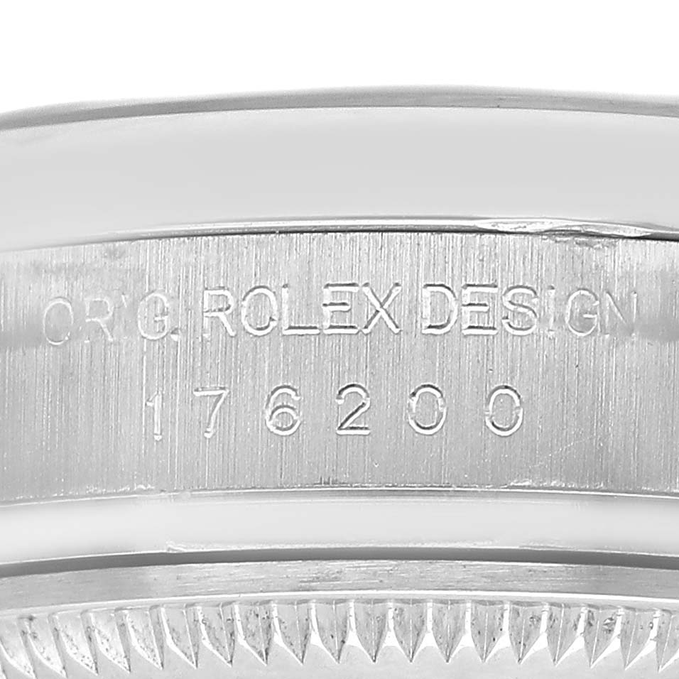 The image shows a close-up of the case side of a Rolex Oyster Perpetual 176200 Womens Stainless Steel Black Dial, featuring the model number and a portion of the bezel.