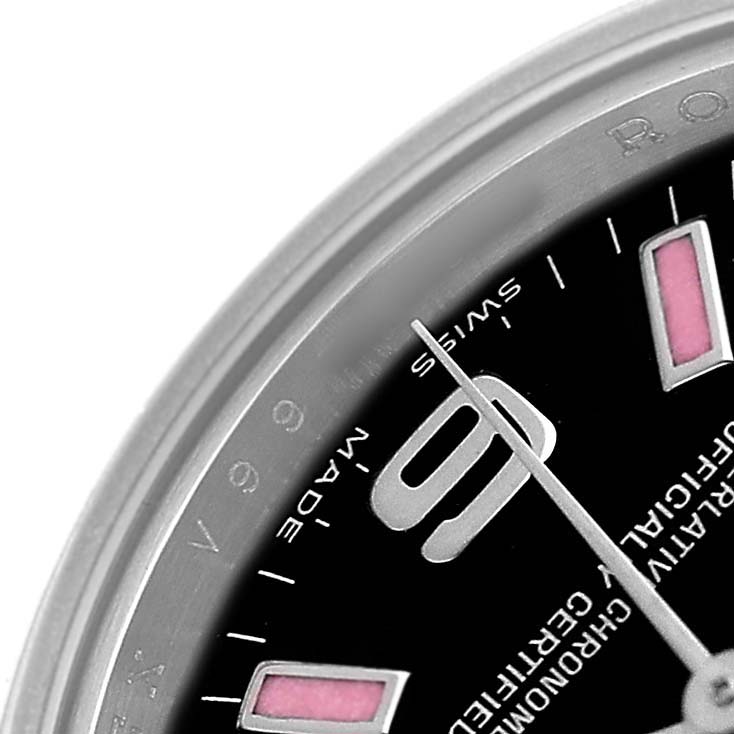 The image shows a close-up of the dial on the Rolex Oyster Perpetual 176200 Womens Stainless Steel Black Dial, highlighting the hour markers and hands.