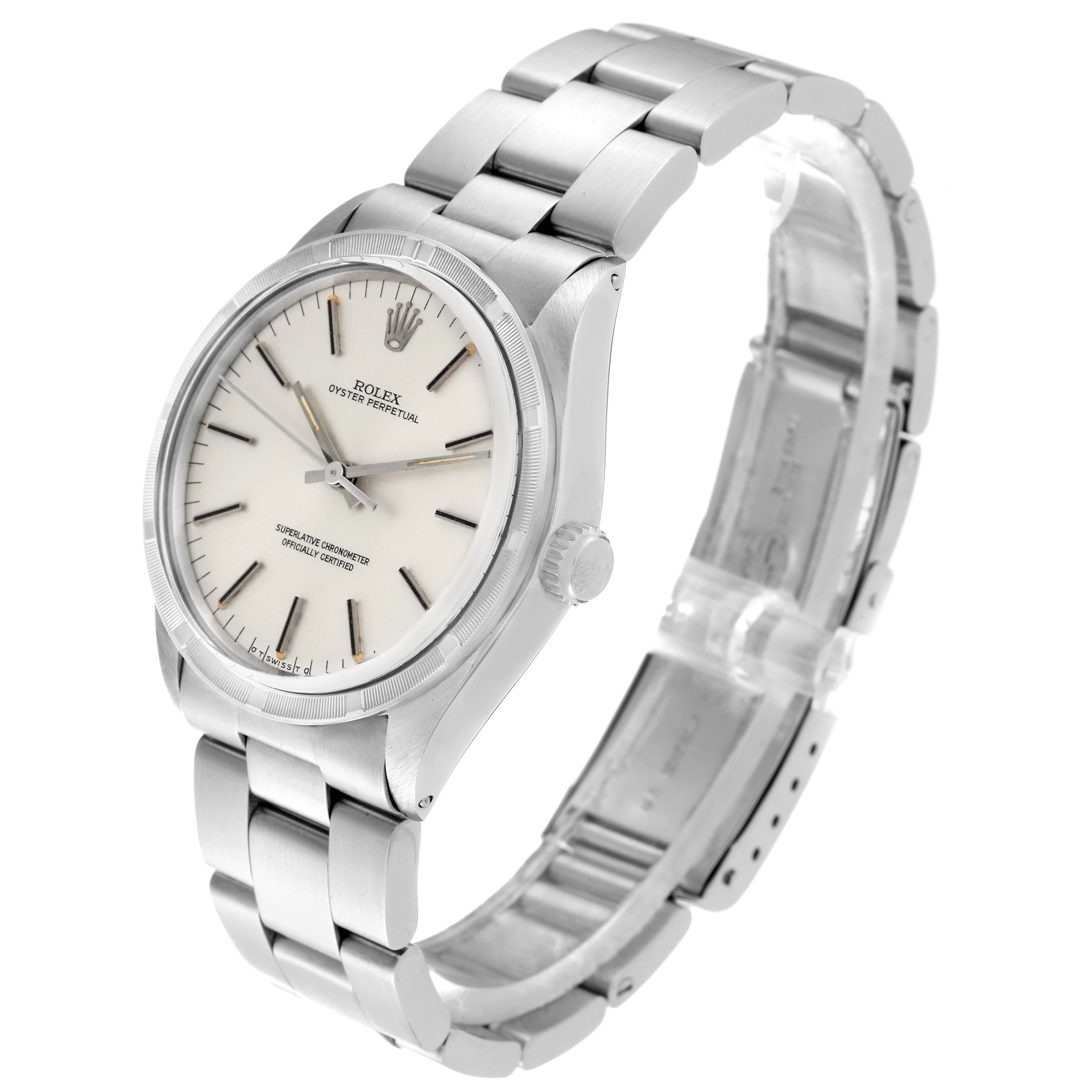 The image shows a Rolex Vintage Collection 1007 Men's Stainless Steel Silver Dial 1007 Men's Stainless Steel Silver Dial watch from a three-quarter angle, highlighting its dial, bezel, crown, and metal bracelet.