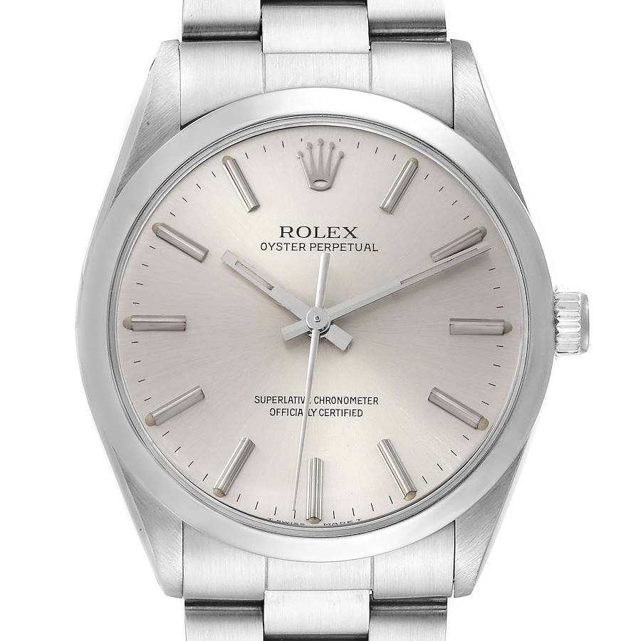 The image shows a front view of a Vintage Collection Rolex watch, highlighting its dial, crown, and part of the metal bracelet.