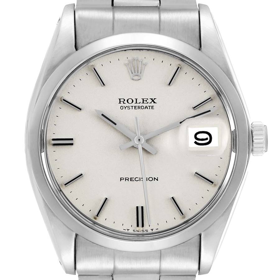 The Rolex Vintage Collection model 6694 is shown from a frontal angle, displaying its dial, indices, hands, crown, and bracelet.