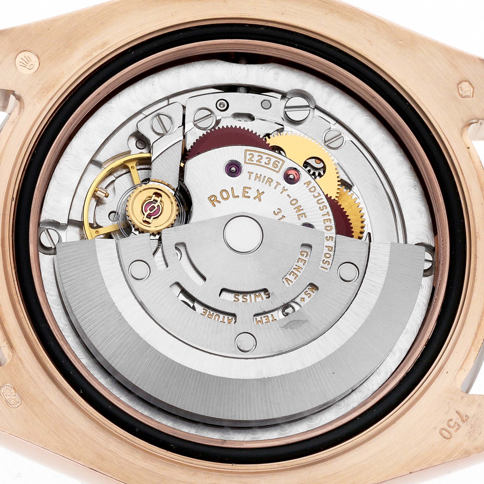 The image shows the back view of the Rolex Pearlmaster 81285 Women's Rose Gold Pink Dial 81285 Women's Rose Gold Pink Dial watch, revealing its internal automatic movement mechanism.