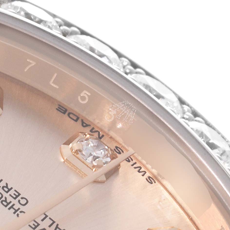 This close-up image of the Rolex Pearlmaster 81285 Women's Rose Gold Pink Dial 81285 Women's Rose Gold Pink Dial watch shows the edge of the diamond-studded bezel and part of the dial.