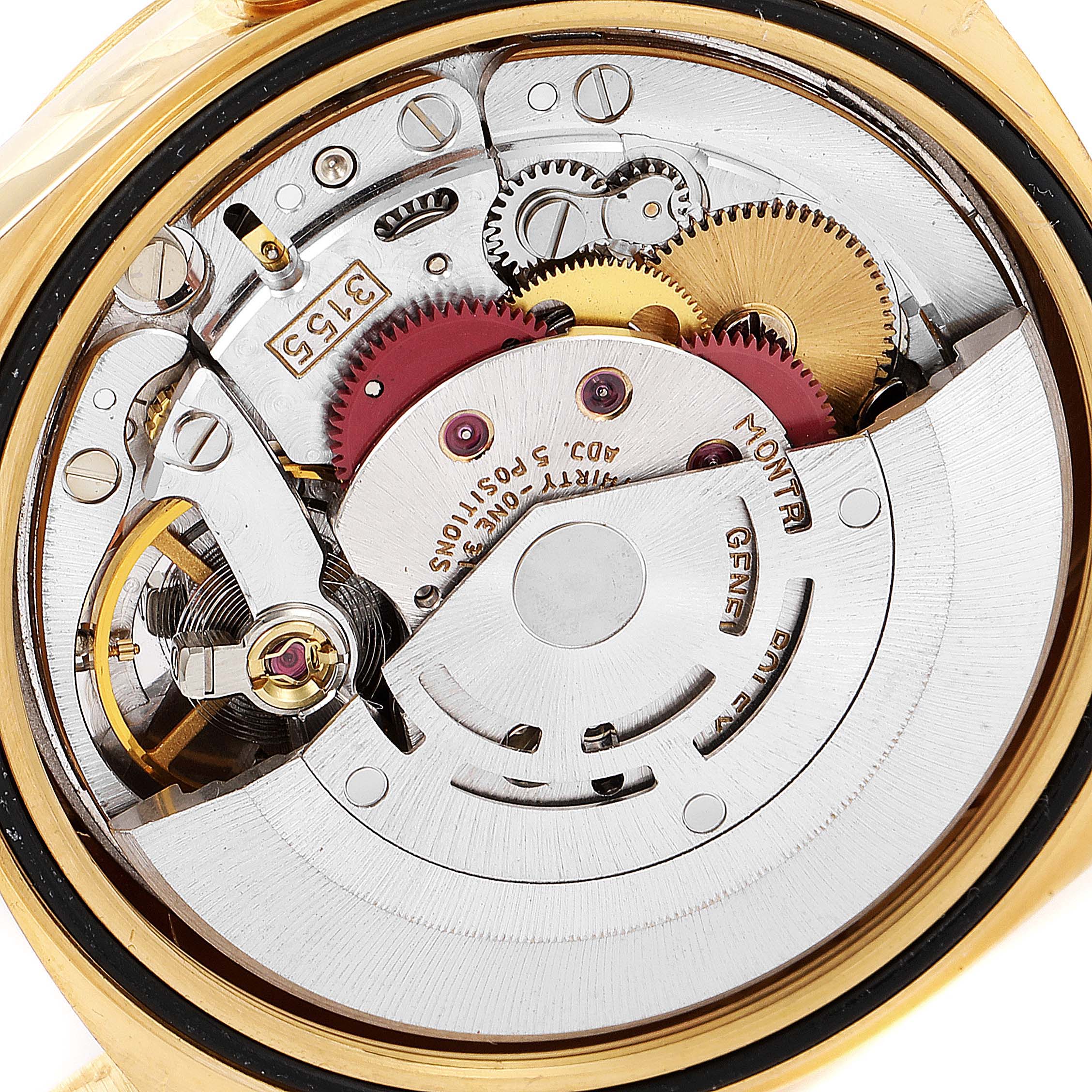 The image shows the internal mechanism and gears of a Rolex President 18238 Men
s Yellow Gold Champagne Dial 18238 Men
s Yellow Gold Champagne Dial model watch from a close-up, back angle.