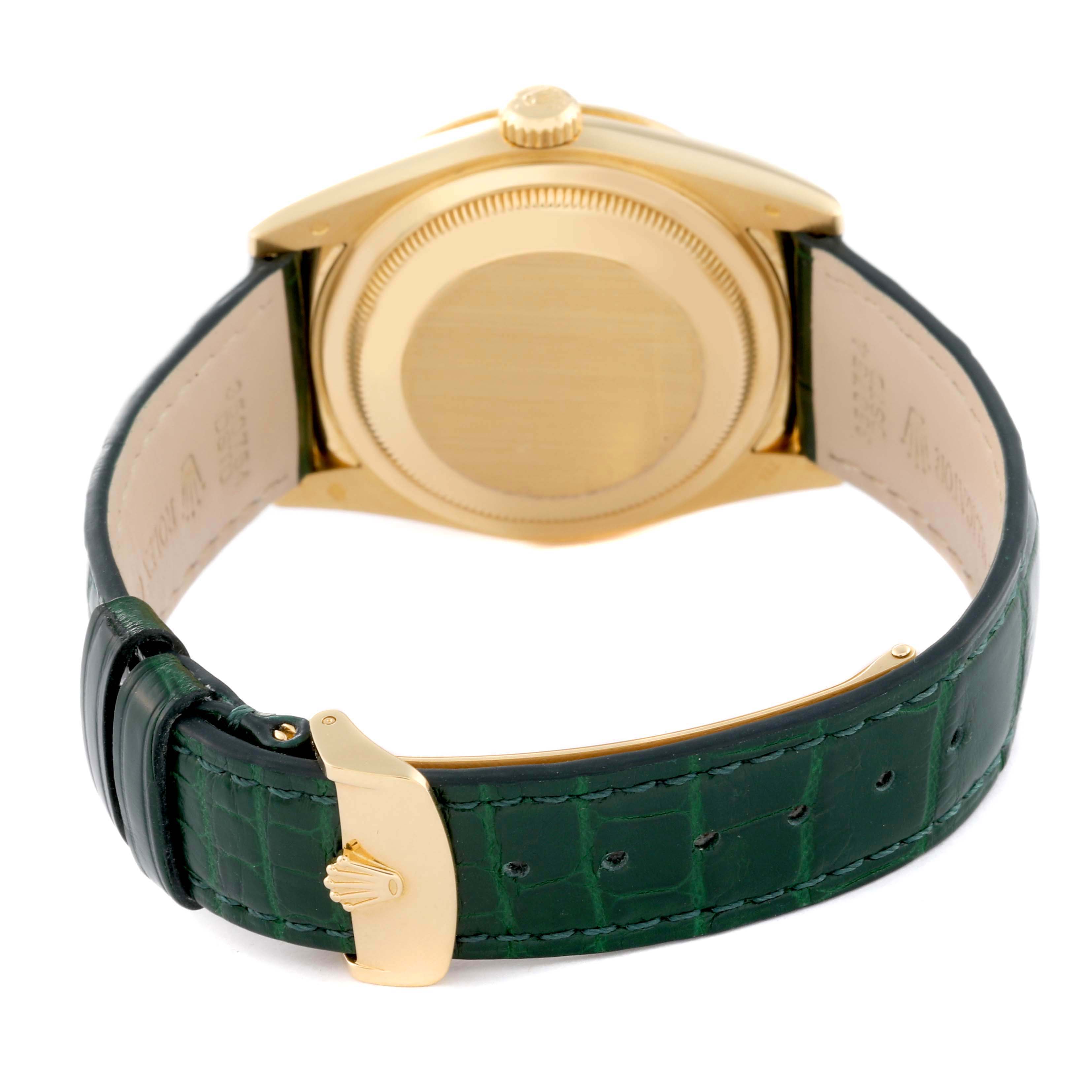 This image shows the back case and leather strap of a Rolex President 118138 Men's Yellow Gold Green Dial 118138 Men's Yellow Gold Green Dial model watch, emphasizing the clasp and crown.