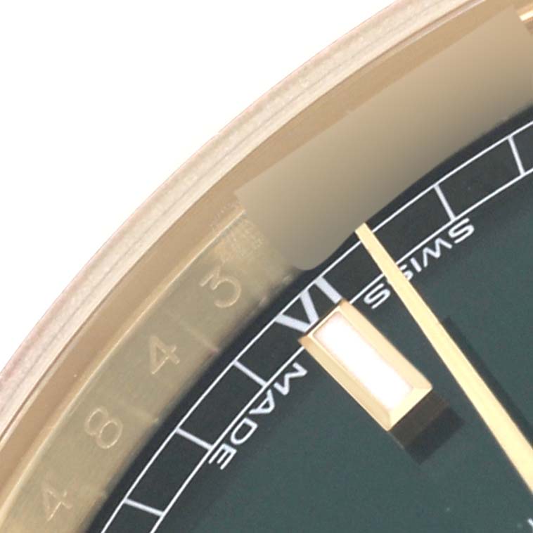 The image shows a close-up of the dial and bezel of a Rolex President 118138 Men's Yellow Gold Green Dial 118138 Men's Yellow Gold Green Dial model watch, highlighting the "Swiss Made" marking.