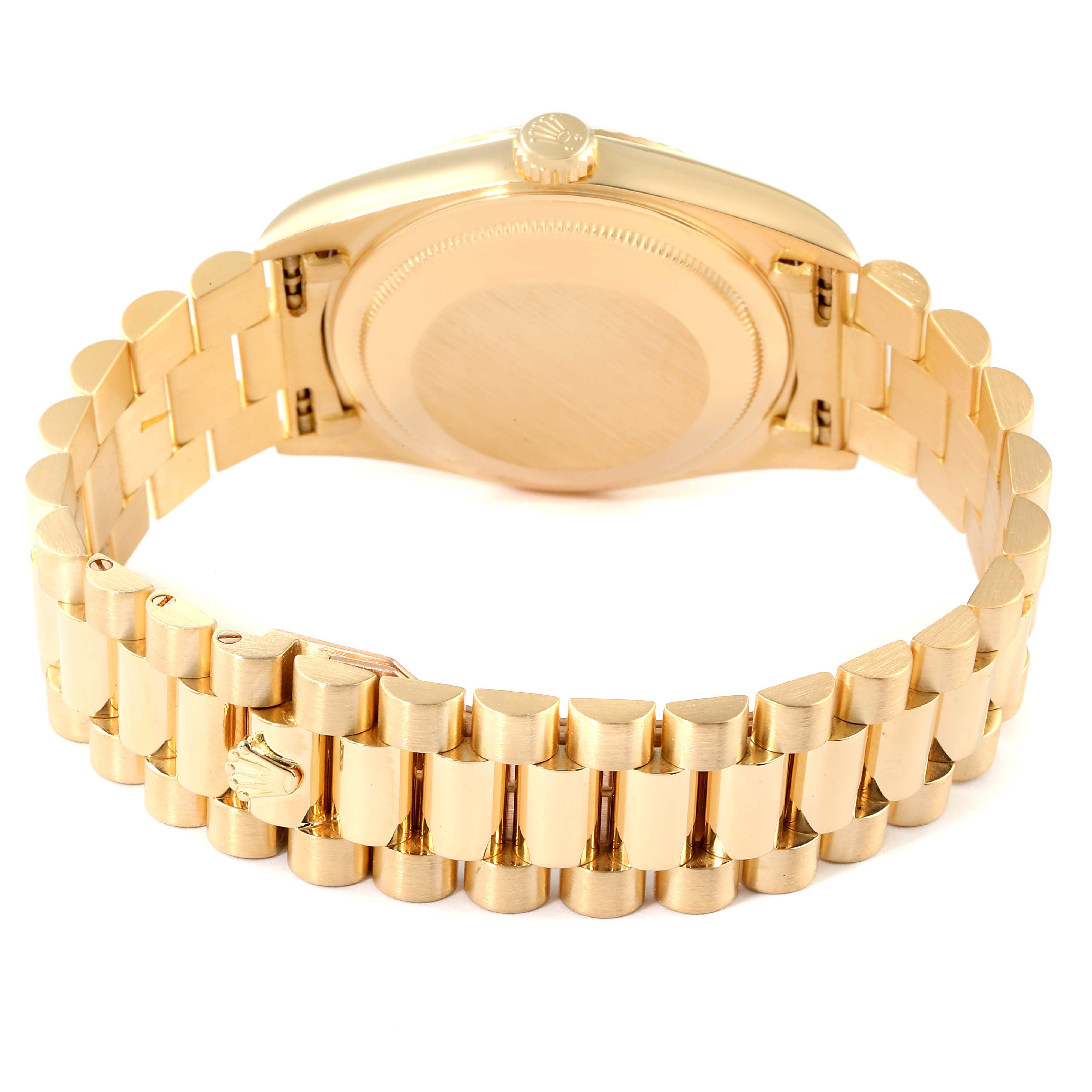 The image shows the back view of a gold Rolex President 18238 Men's Yellow Gold Silver Dial 18238 Men's Yellow Gold Silver Dial model watch, focusing on its bracelet and case back.