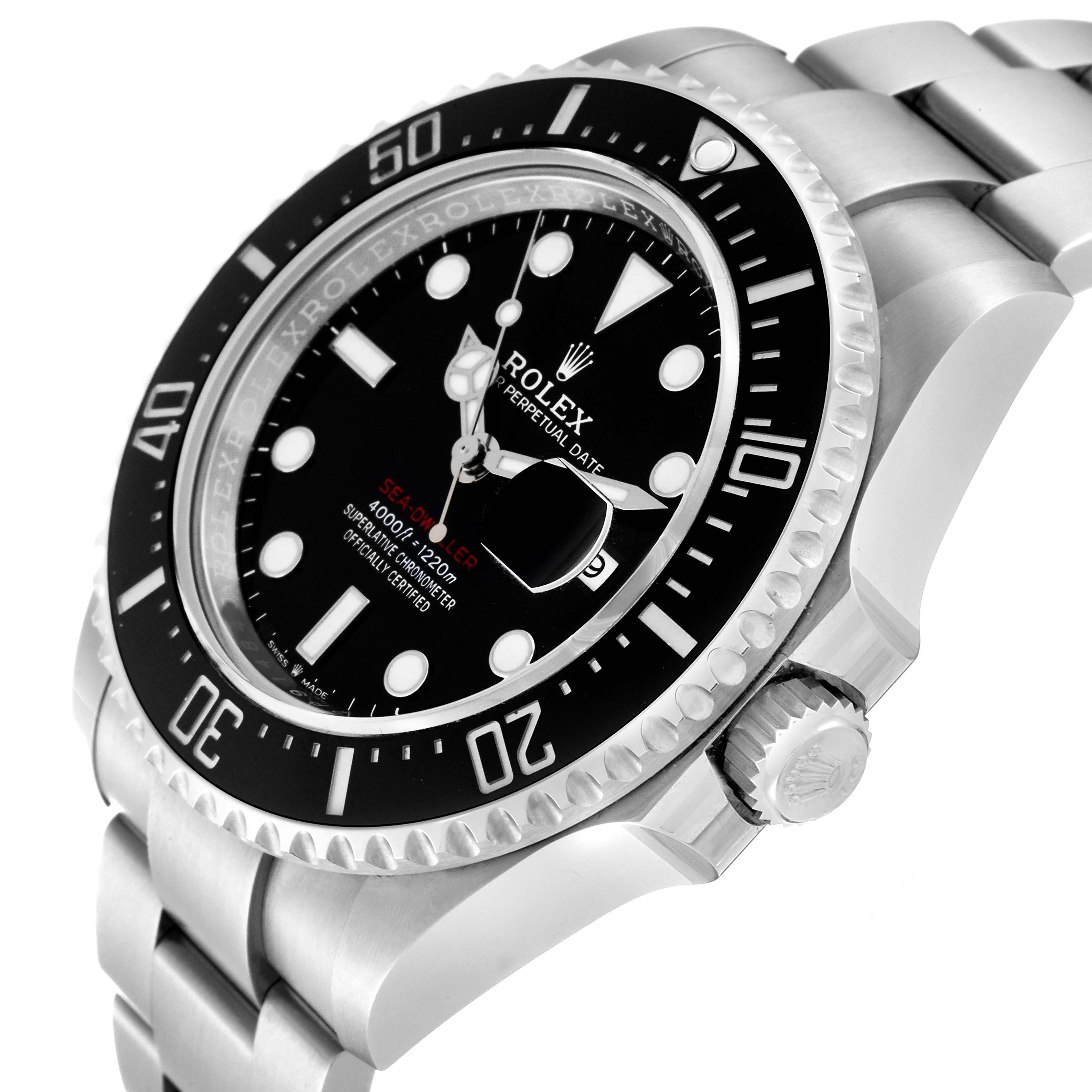 The image shows a side angle of the Rolex Sea-Dweller 126600 Men
s Stainless Steel Black Dial 126600 Men
s Stainless Steel Black Dial, highlighting the dial, bezel, crown, and part of the bracelet.