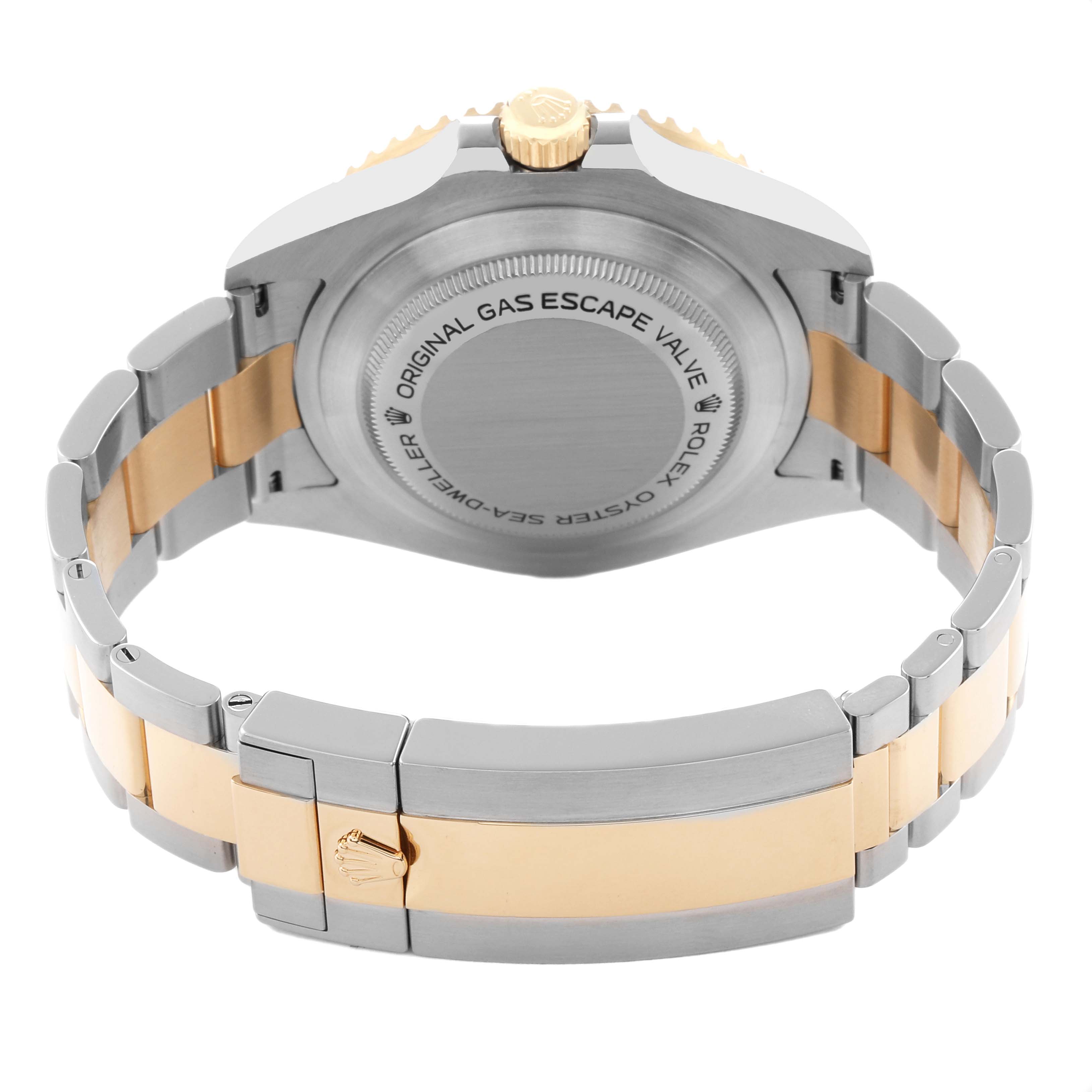 The image shows the back and bracelet of a Rolex Sea-Dweller 126603 Men
s Steel and Gold (two tone) Black Dial, highlighting the case back and two-tone metal links.