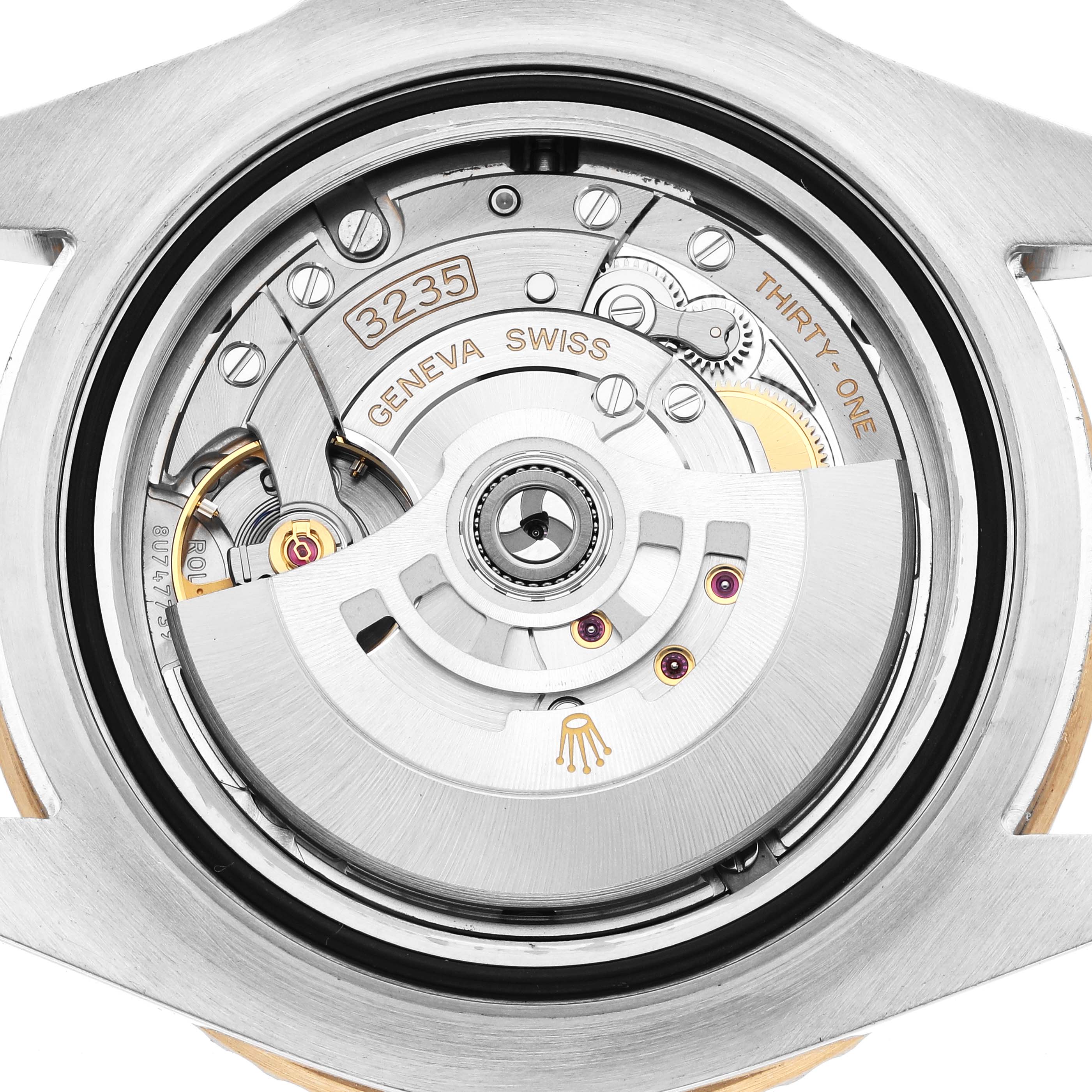 The image shows the movement of a Rolex Sea-Dweller 126603 Men
s Steel and Gold (two tone) Black Dial watch, viewed from the back, highlighting its intricate mechanics.