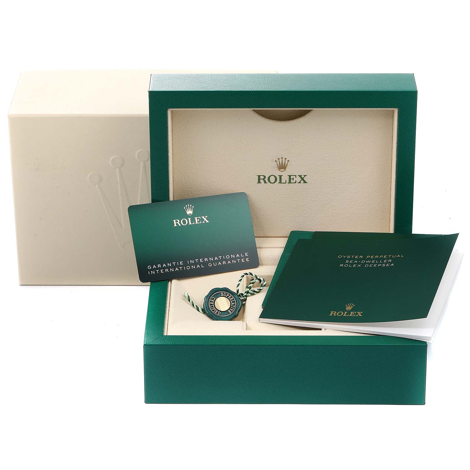 The image shows the accessories for a Rolex Sea-Dweller 126603 Men's Steel and Gold (two tone) Black Dial 126603 Men's Steel and Gold (two tone) Black Dial, including the box, guarantee card, tag, and manual.