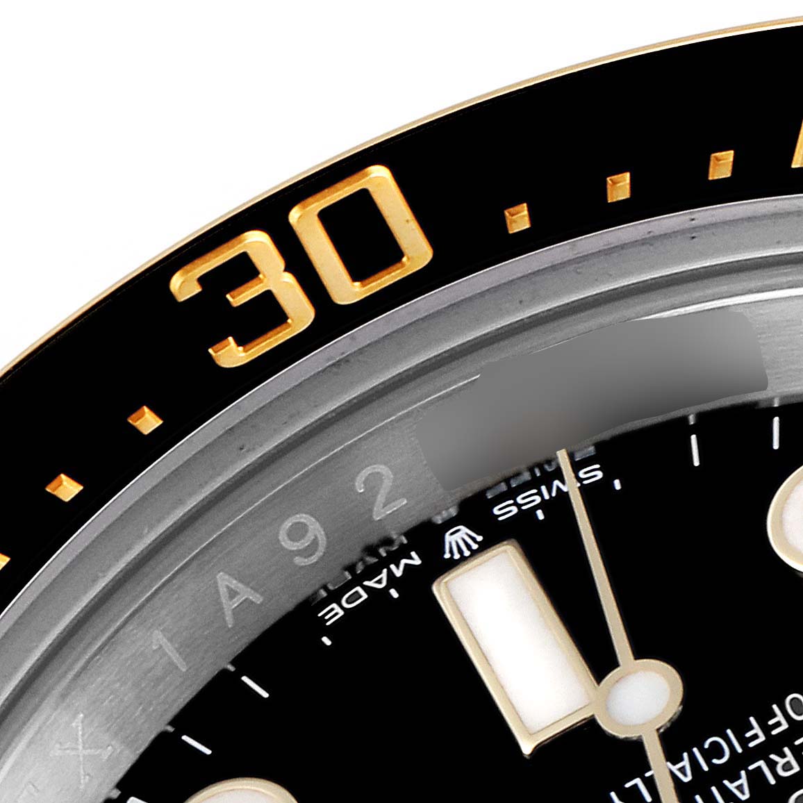 The image shows a close-up of the bezel, dial, and part of the serial number of the Rolex Sea-Dweller 126603 Men's Steel and Gold (two tone) Black Dial 126603 Men's Steel and Gold (two tone) Black Dial watch.