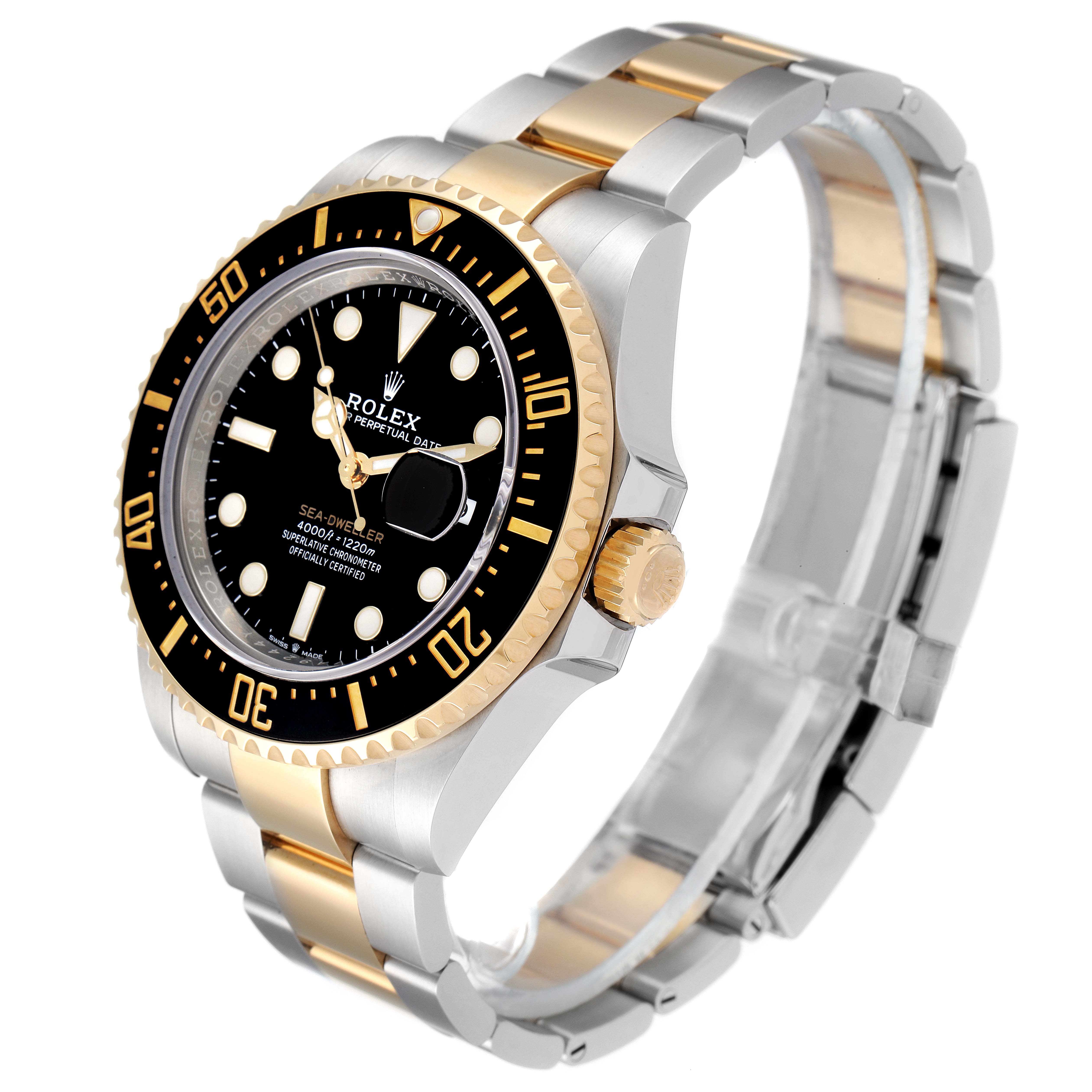The Rolex Sea-Dweller 126603 Men's Steel and Gold (two tone) Black Dial 126603 Men's Steel and Gold (two tone) Black Dial watch is shown at an oblique angle, highlighting the black dial, gold bezel, and two-tone bracelet.