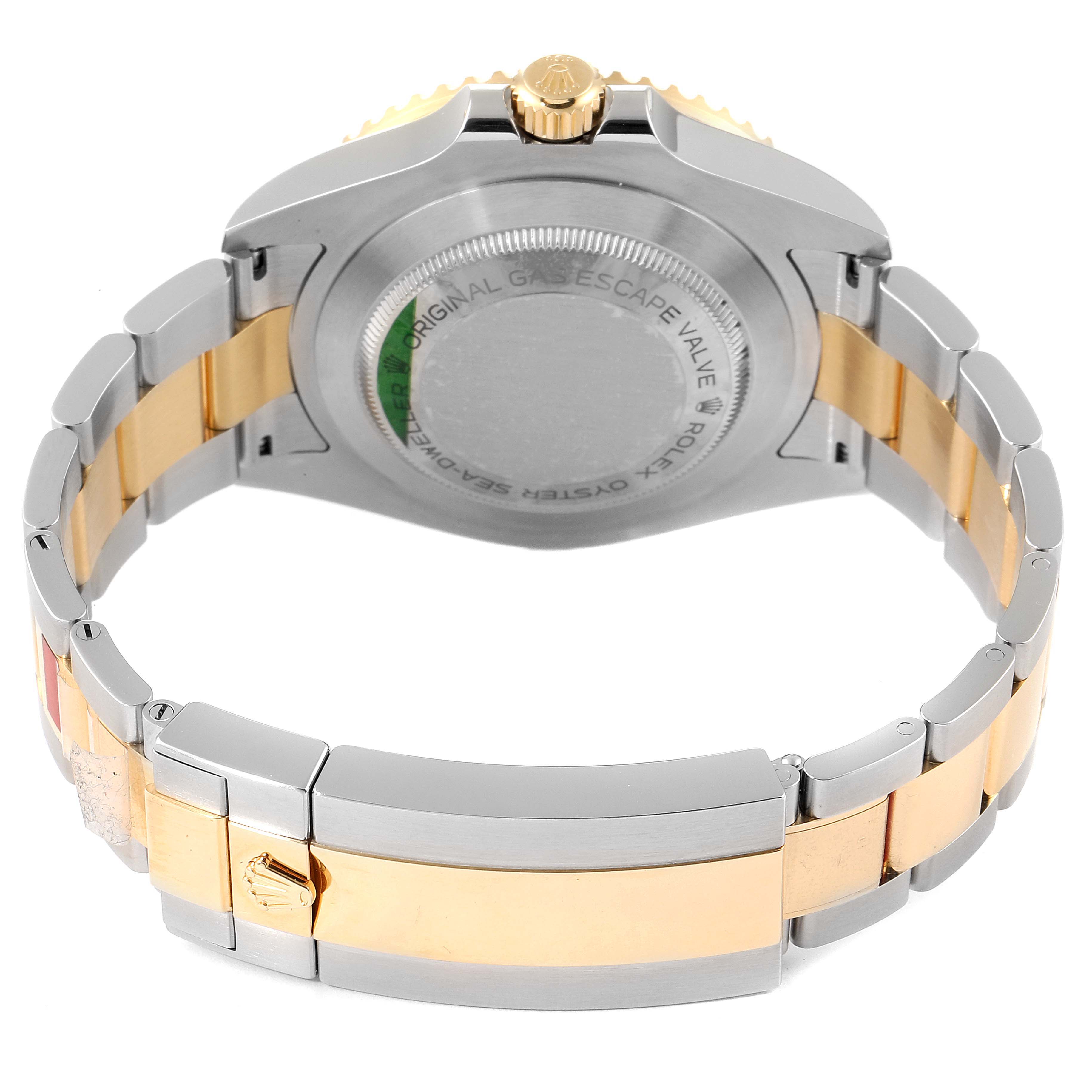 The image shows the back view of the Rolex Sea-Dweller 126603 Men's Steel and Gold (two tone) Black Dial 126603 Men's Steel and Gold (two tone) Black Dial watch, highlighting the case back and the two-tone bracelet.