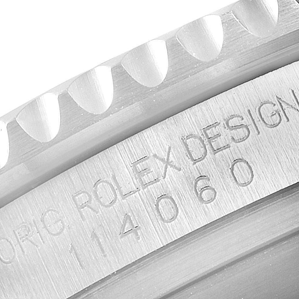 This image shows a close-up of the case side and bezel of a Rolex Submariner 114060 Men
s Stainless Steel Black Dial 114060 Men
s Stainless Steel Black Dial, focusing on its engraved model number.