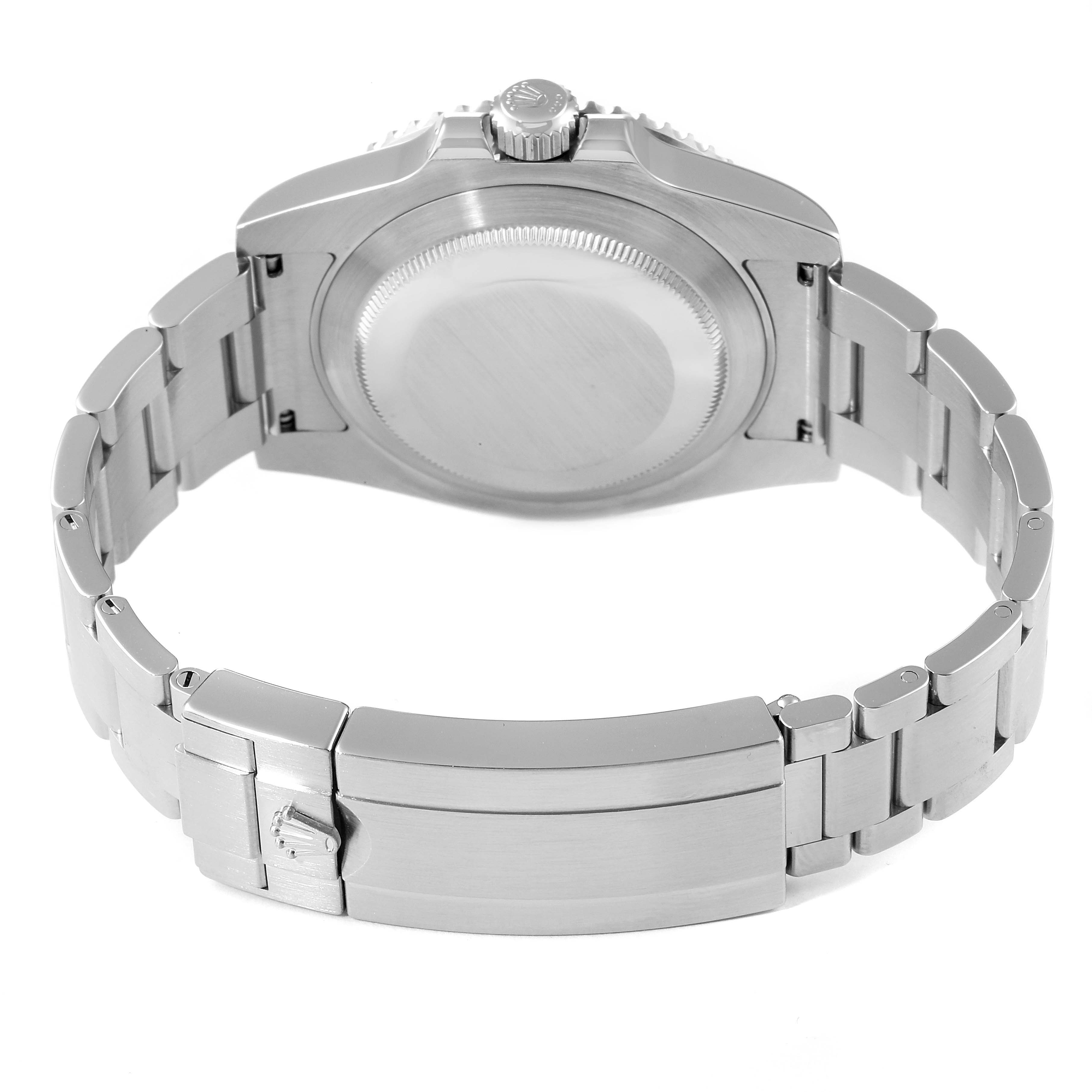 The image shows the back view of a Rolex Submariner 114060 Men
s Stainless Steel Black Dial 114060 Men
s Stainless Steel Black Dial watch, highlighting the case back and the bracelet clasp.