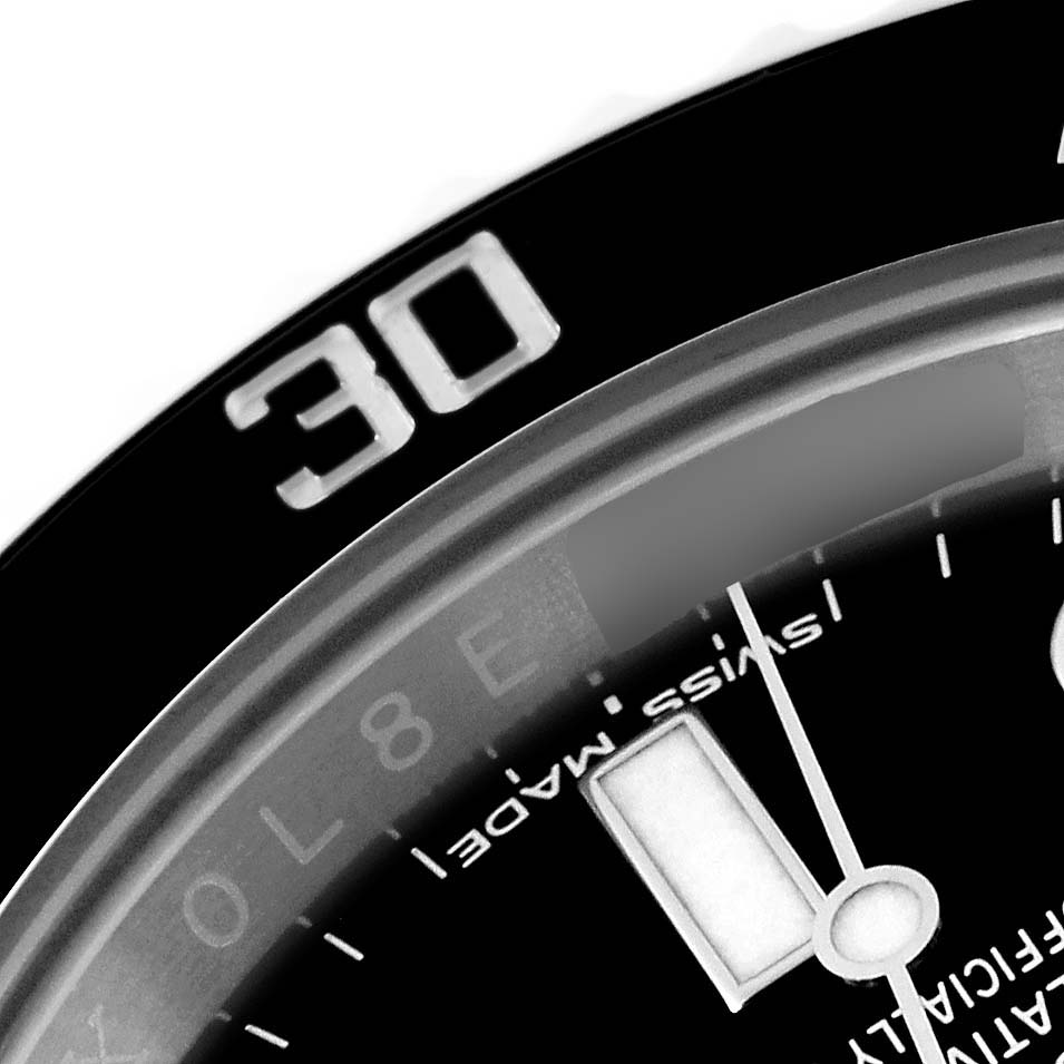 The image shows a close-up of the bezel and part of the dial of a Rolex Submariner 114060 Men
s Stainless Steel Black Dial 114060 Men
s Stainless Steel Black Dial watch, focusing on the "30" marker.