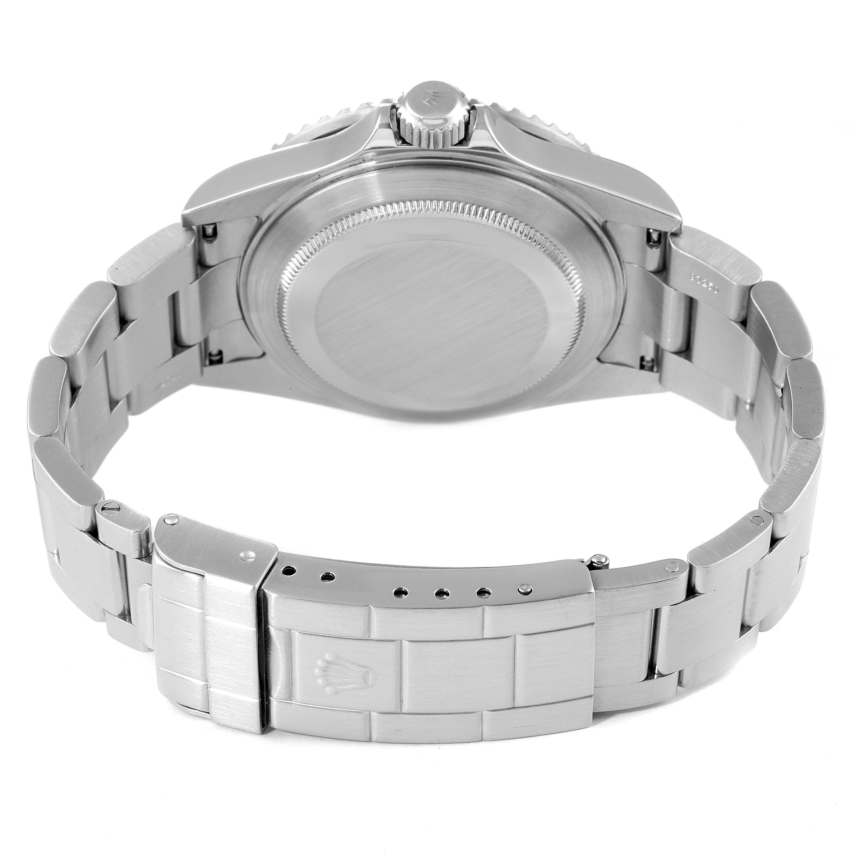 The image shows the back case and bracelet of a Rolex Submariner 16610 Men
s Stainless Steel Black Dial 16610 Men
s Stainless Steel Black Dial watch from a rear angle.