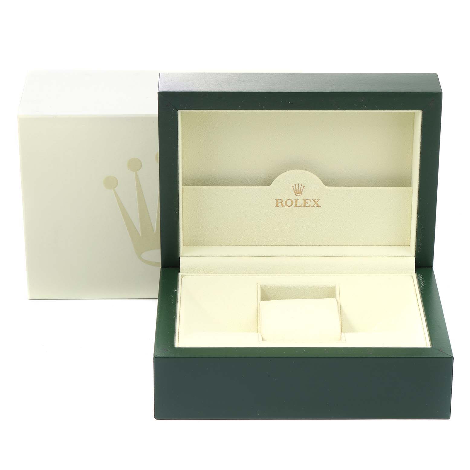 The image shows an open Rolex Submariner 16610 Men
s Stainless Steel Black Dial 16610 Men
s Stainless Steel Black Dial watch box, featuring the inner compartments for storing the watch.