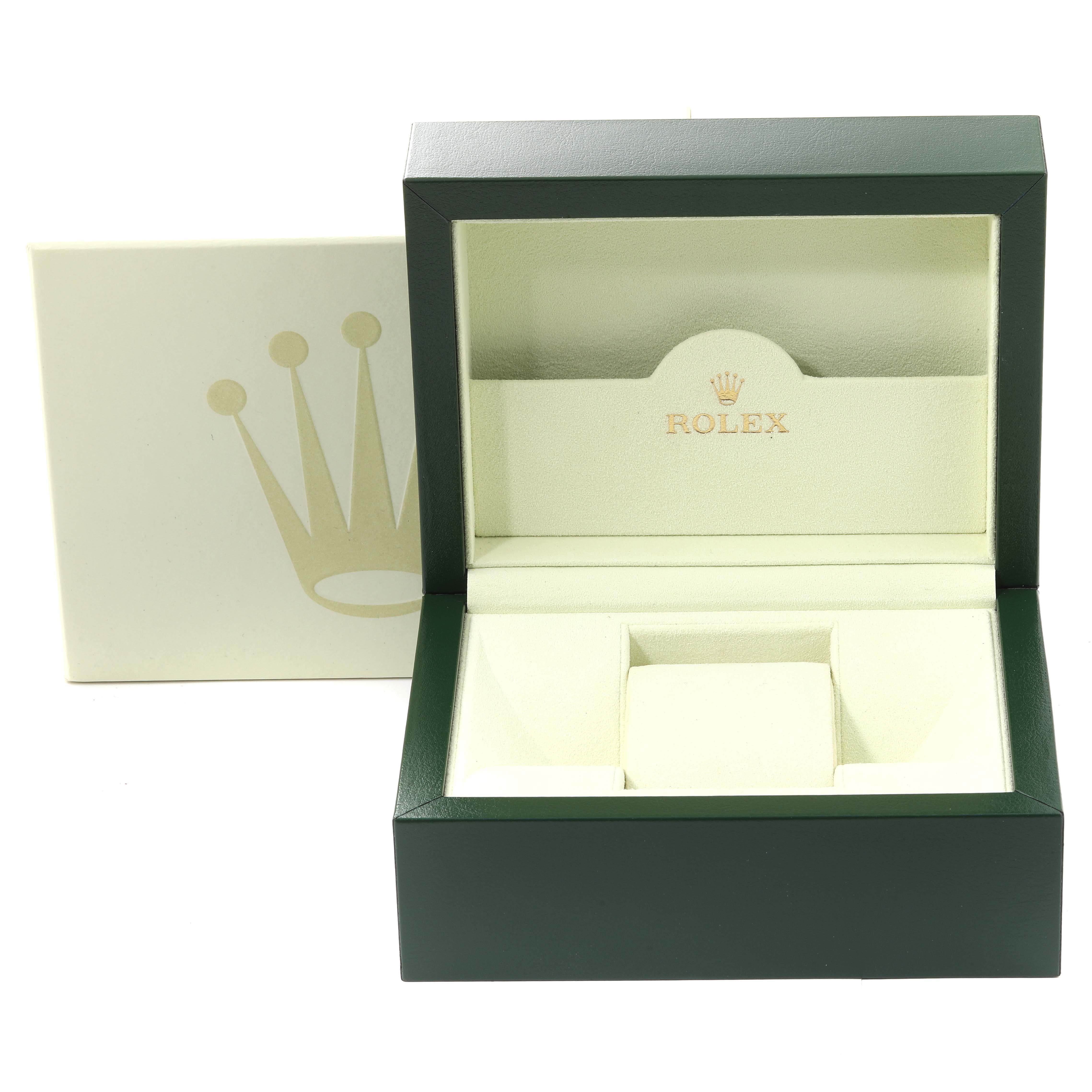 The image shows an open Rolex Submariner 16610 Men
s Stainless Steel Black Dial 16610 Men
s Stainless Steel Black Dial watch box, revealing its cushioned interior and the Rolex logo embossed inside.