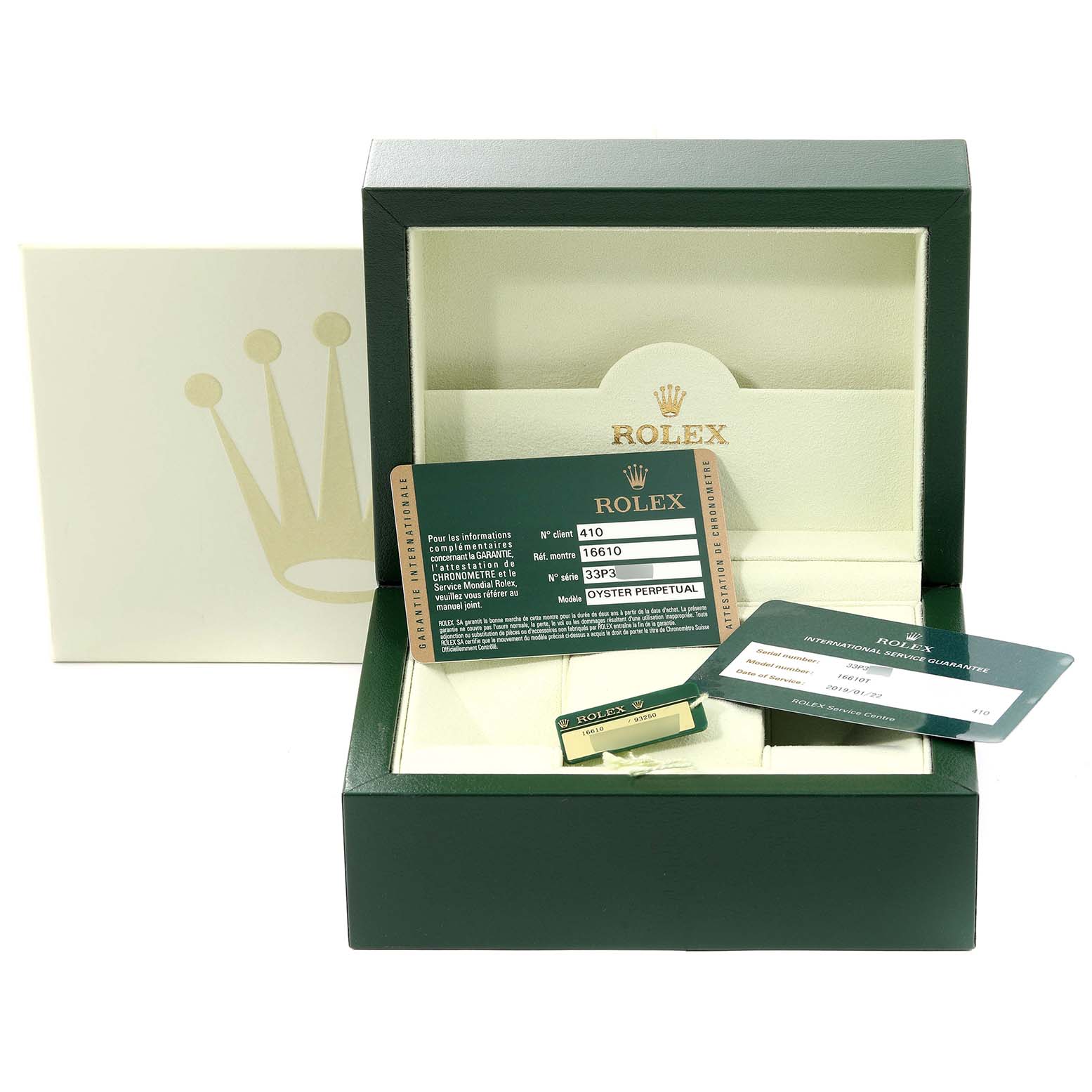 The image shows the open box and authentication cards for a Rolex Submariner 16610 Men's Stainless Steel Black Dial 16610 Men's Stainless Steel Black Dial watch.