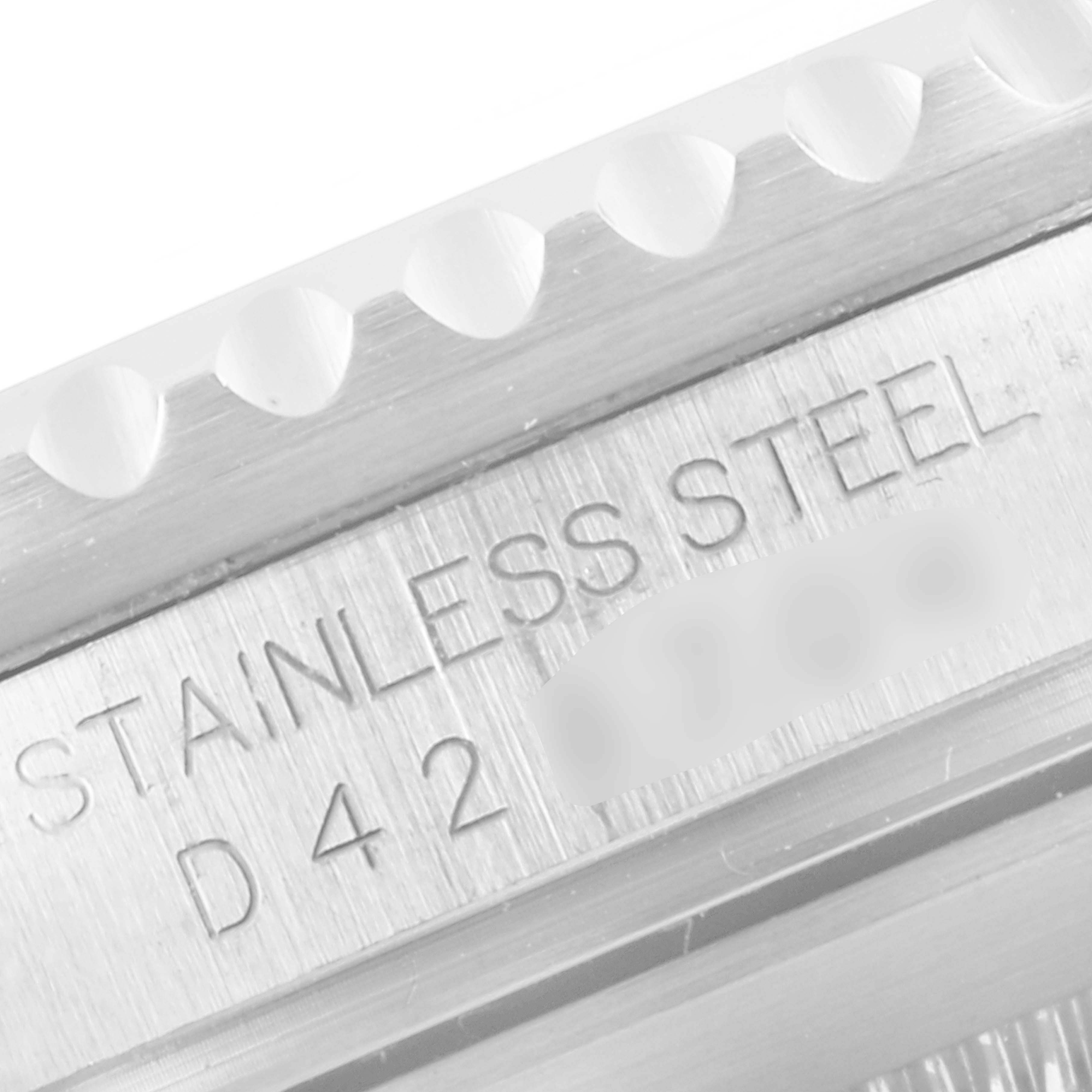 The image shows a close-up of the stainless steel part of the bezel and casing of a Rolex Submariner 16610LV Men
s Stainless Steel Black Dial 16610LV Men
s Stainless Steel Black Dial watch.