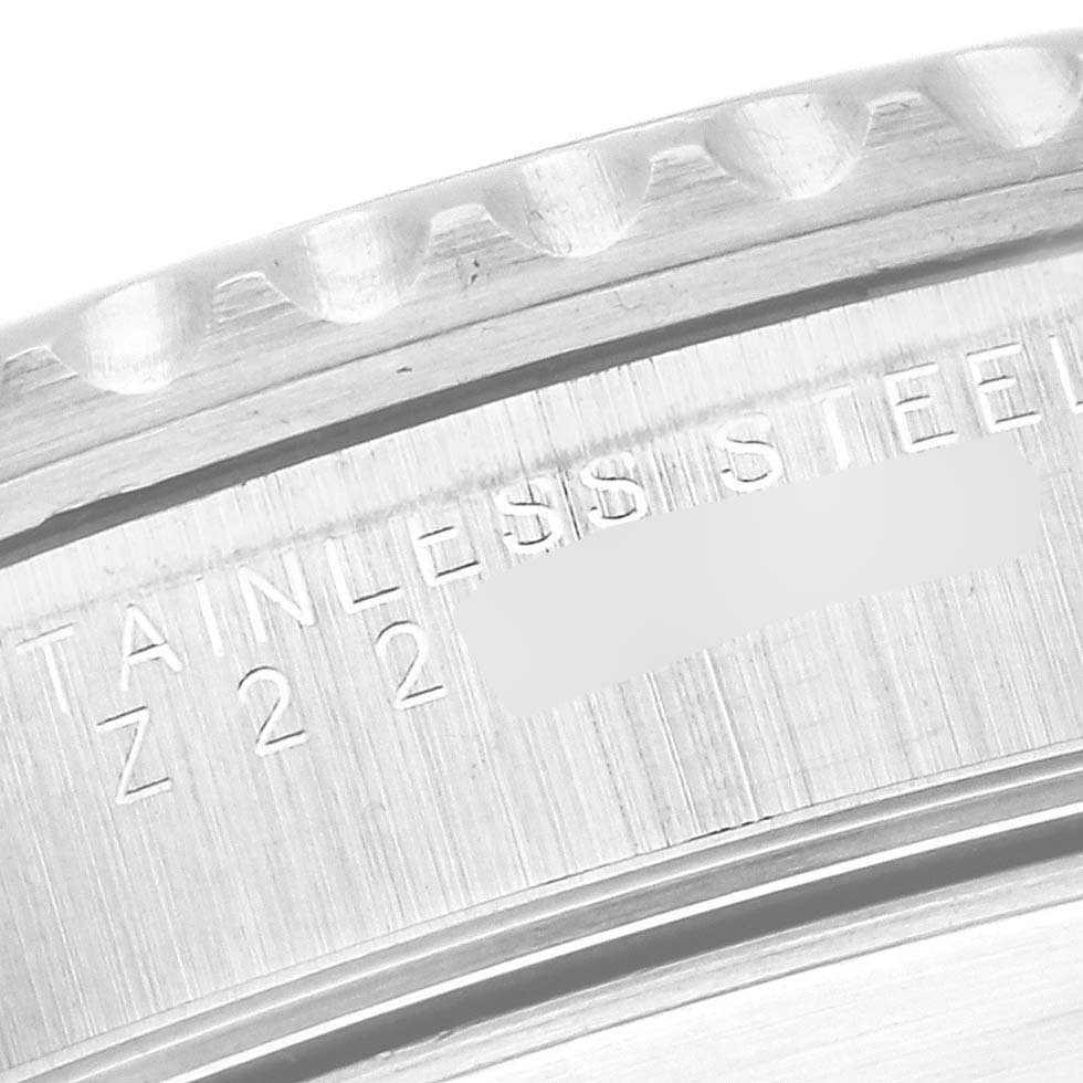 The image shows a close-up of the case back of a Rolex Submariner 14060 Men's Stainless Steel Black Dial 14060 Men's Stainless Steel Black Dial, featuring the stainless steel material and model inscription.