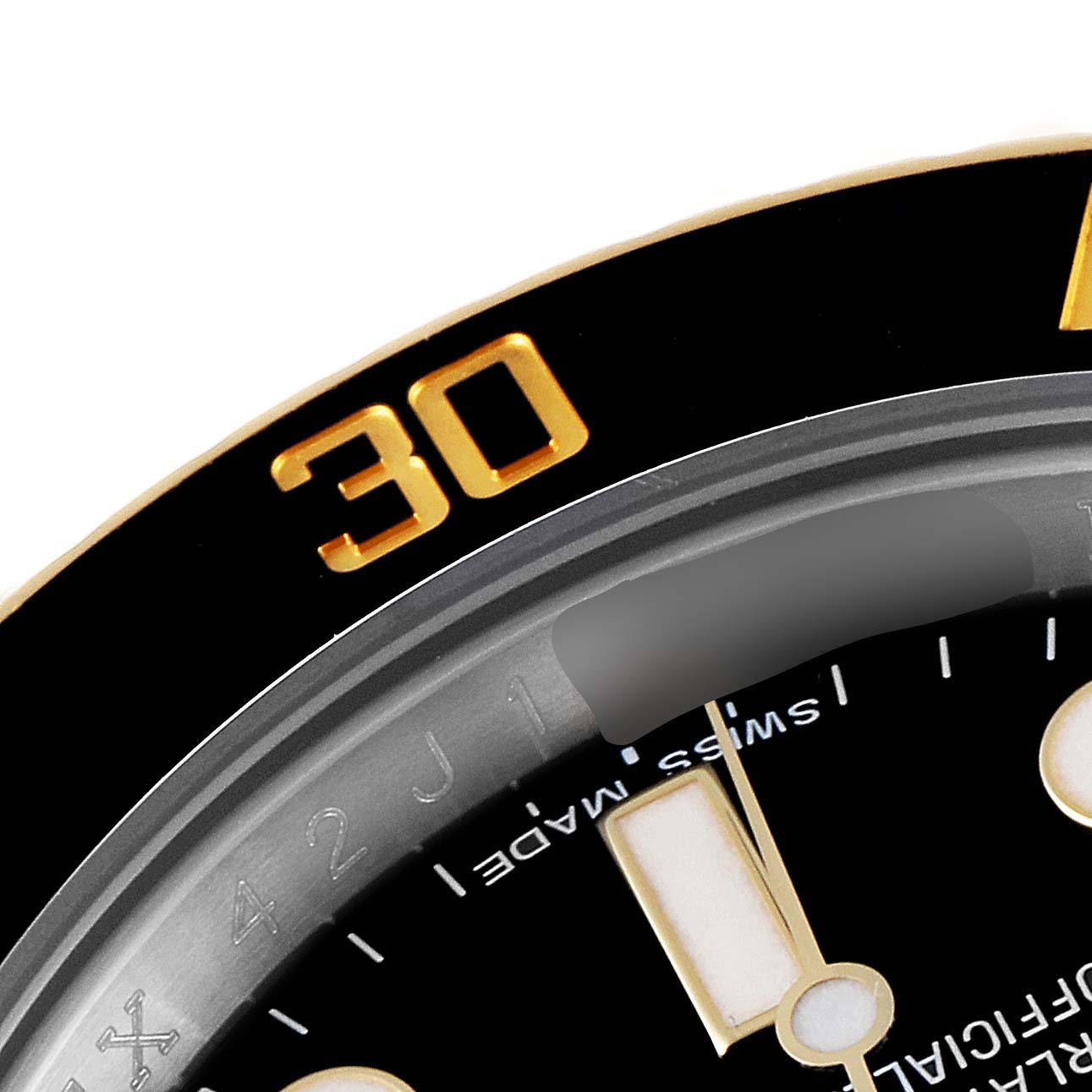 This close-up image shows the bezel and partial dial of the Rolex Submariner 116613 Men
s Steel and Gold (two tone) Black Dial 116613 Men
s Steel and Gold (two tone) Black Dial watch, highlighting the 30-minute marker.