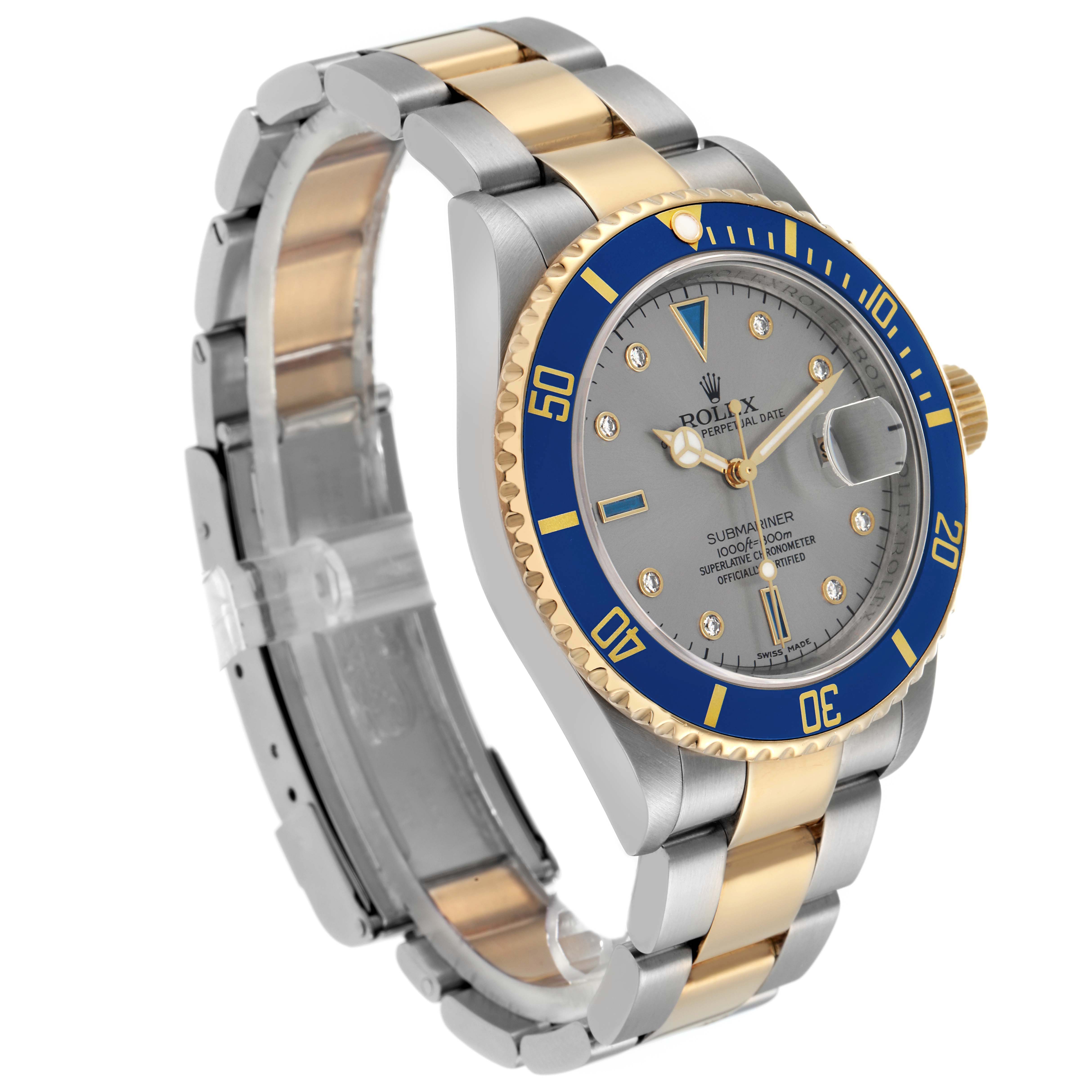 The Rolex Submariner 16613 Men
s Steel and Gold (two tone) Grey Dial watch is shown at a three-quarter angle, highlighting the bezel, dial, case, and two-tone bracelet.