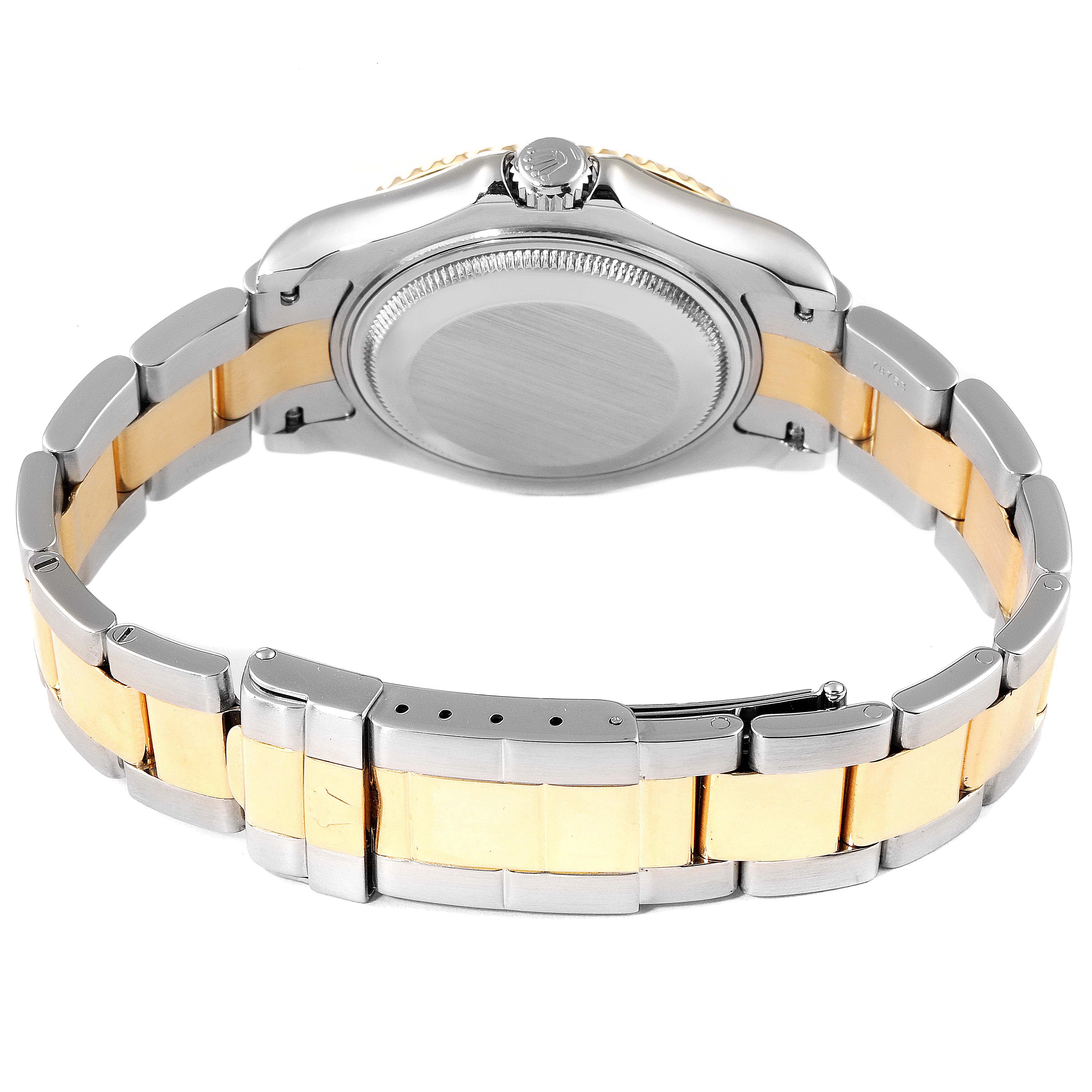 This image shows the back view of the Rolex Yacht-Master 168623 Men
s Steel and Gold (two tone) White Dial 168623 Men
s Steel and Gold (two tone) White Dial watch, highlighting the case back and the two-tone bracelet.