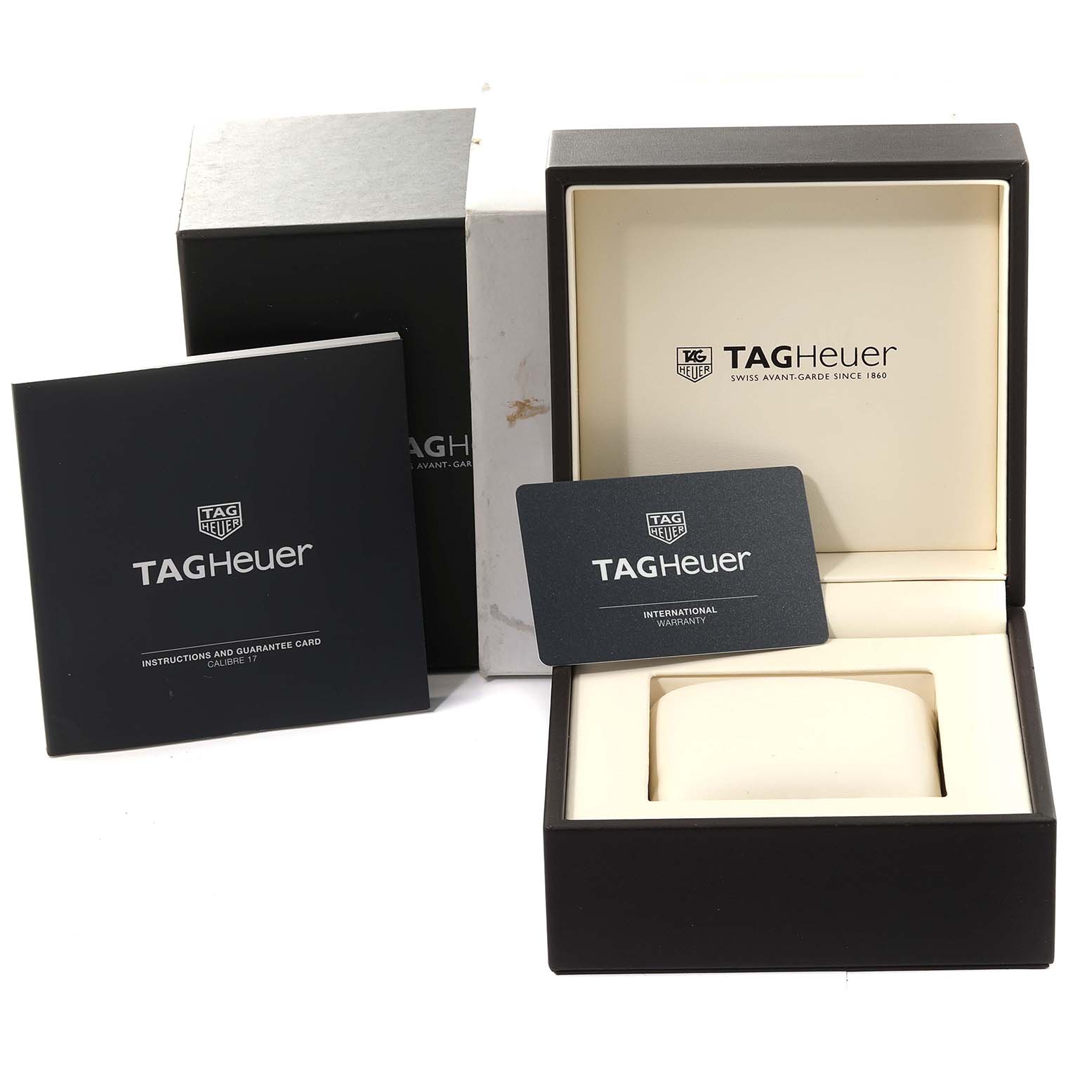 The image shows the box, warranty card, instruction booklet, and packaging for a Tag Heuer Link CBC2112.BA0603 Men's Stainless Steel Blue Dial CBC2112.BA0603 Men's Stainless Steel Blue Dial model watch.