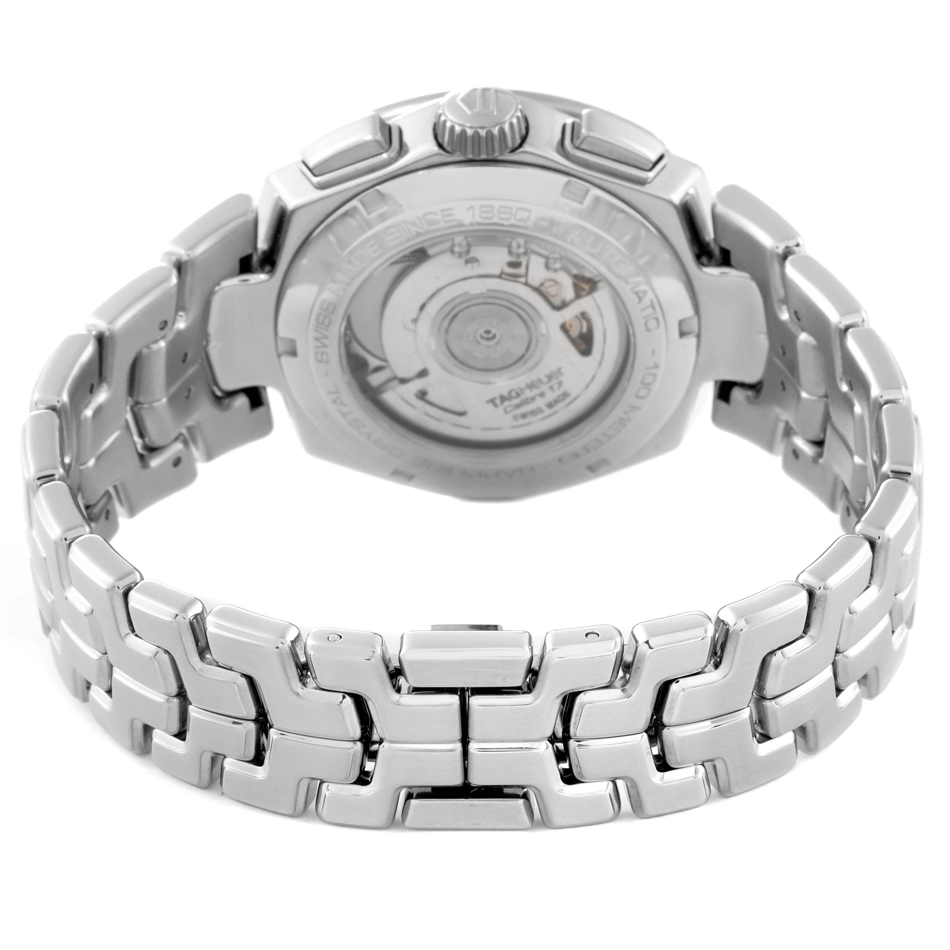 The image shows the back view of the Tag Heuer Link CBC2112.BA0603 Men's Stainless Steel Blue Dial CBC2112.BA0603 Men's Stainless Steel Blue Dial model watch, highlighting the bracelet and transparent case back.