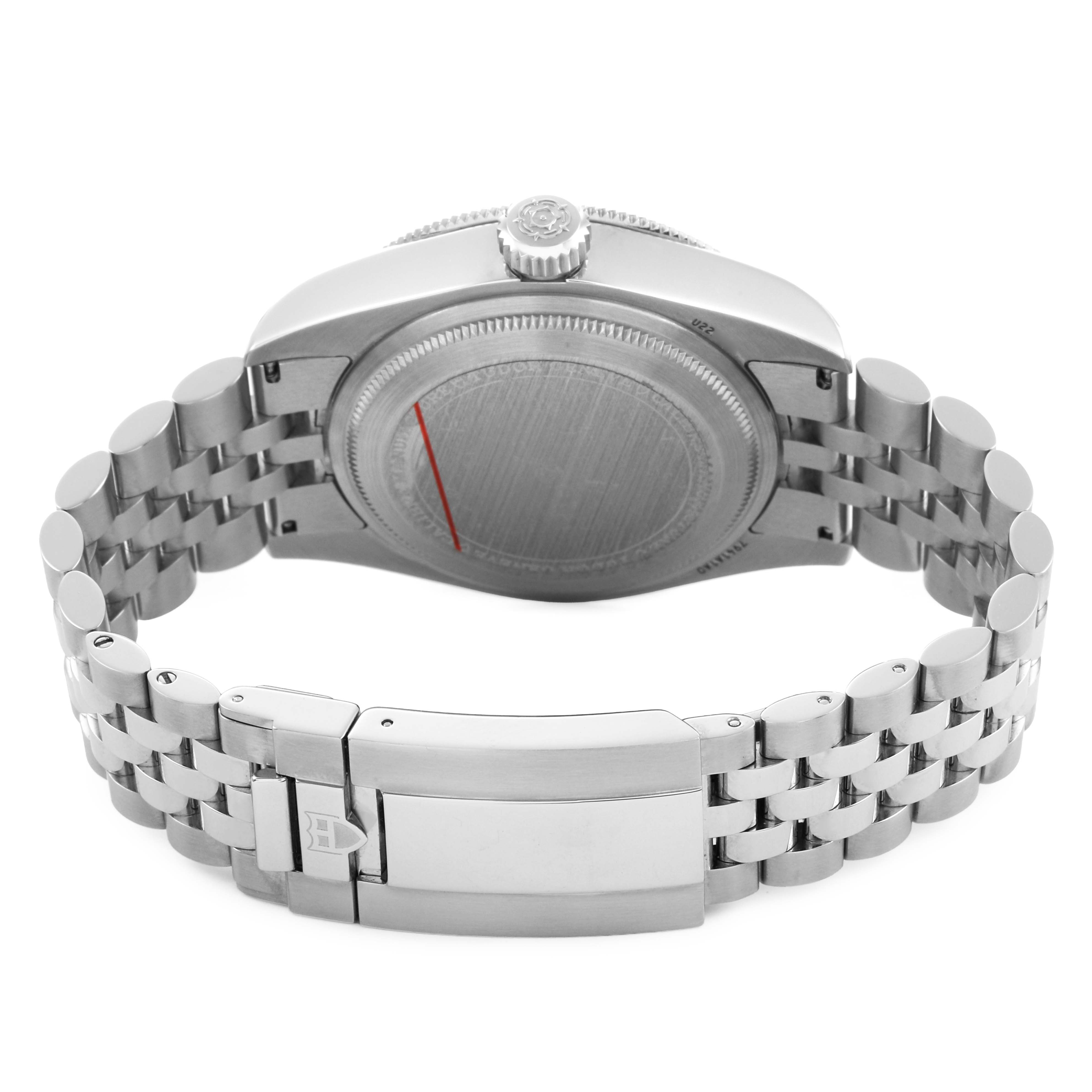 The image shows the back of a Tudor Heritage Black Bay 7941A1A0 Mens Stainless Steel Black Dial watch, highlighting the case back, bracelet, and clasp.