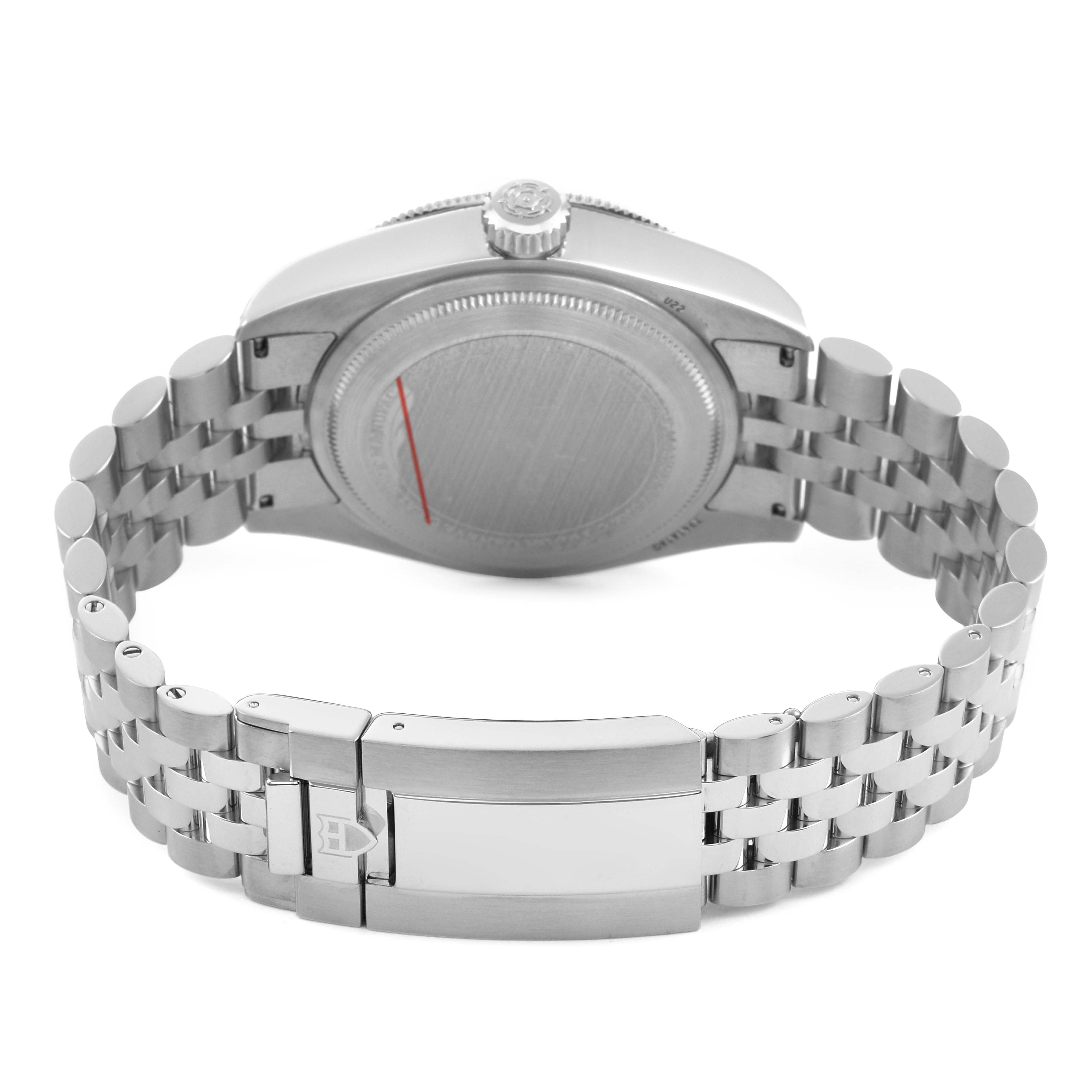 The image shows the back of the Tudor Heritage Black Bay 7941A1A0 Men's Stainless Steel Black Dial watch, highlighting the case back, bracelet, and clasp.