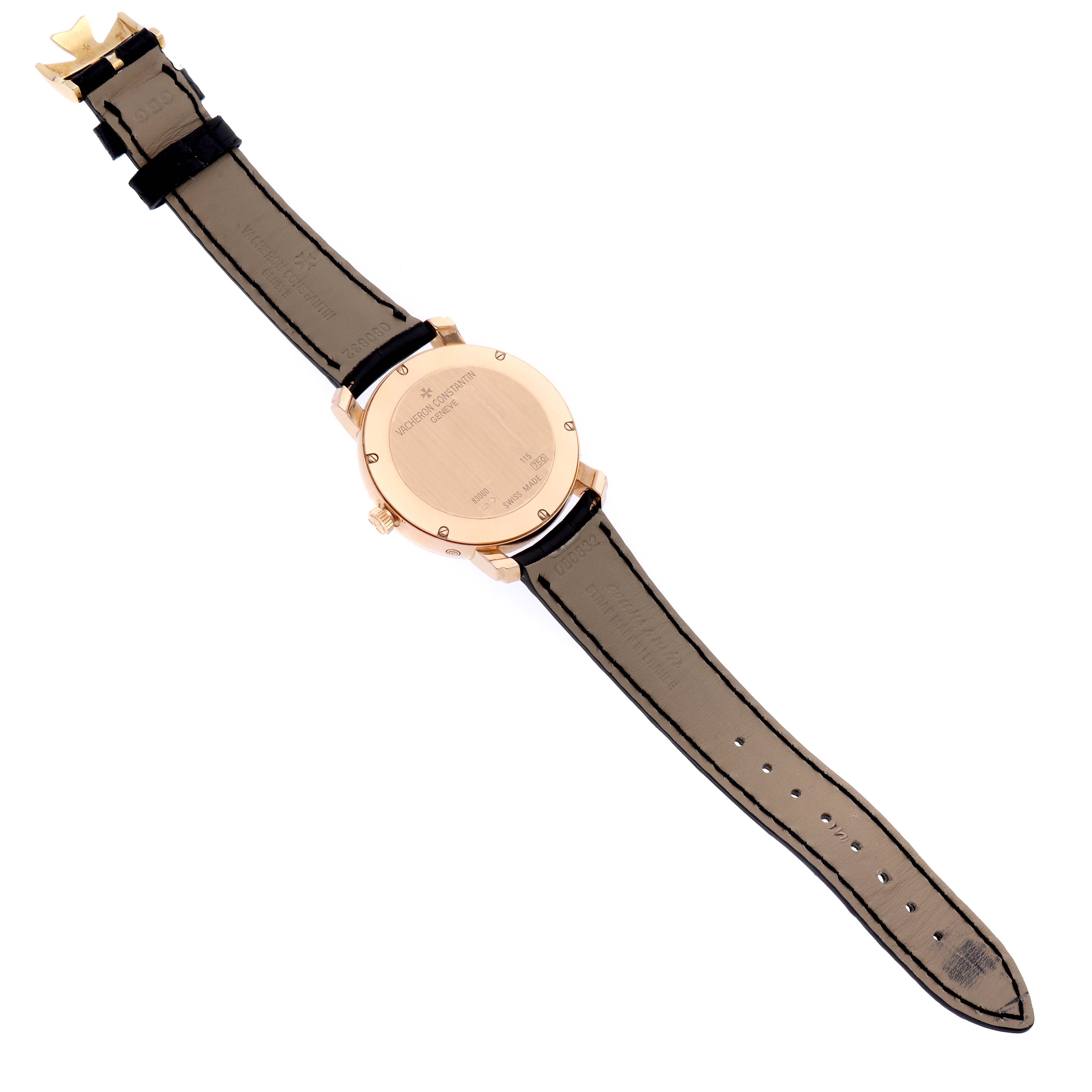 The image shows the back view of a Vacheron Constantin Malte 83060/000R Men
s Rose Gold Silver Dial 83060/000R Men
s Rose Gold Silver Dial watch, highlighting its gold case and leather strap.