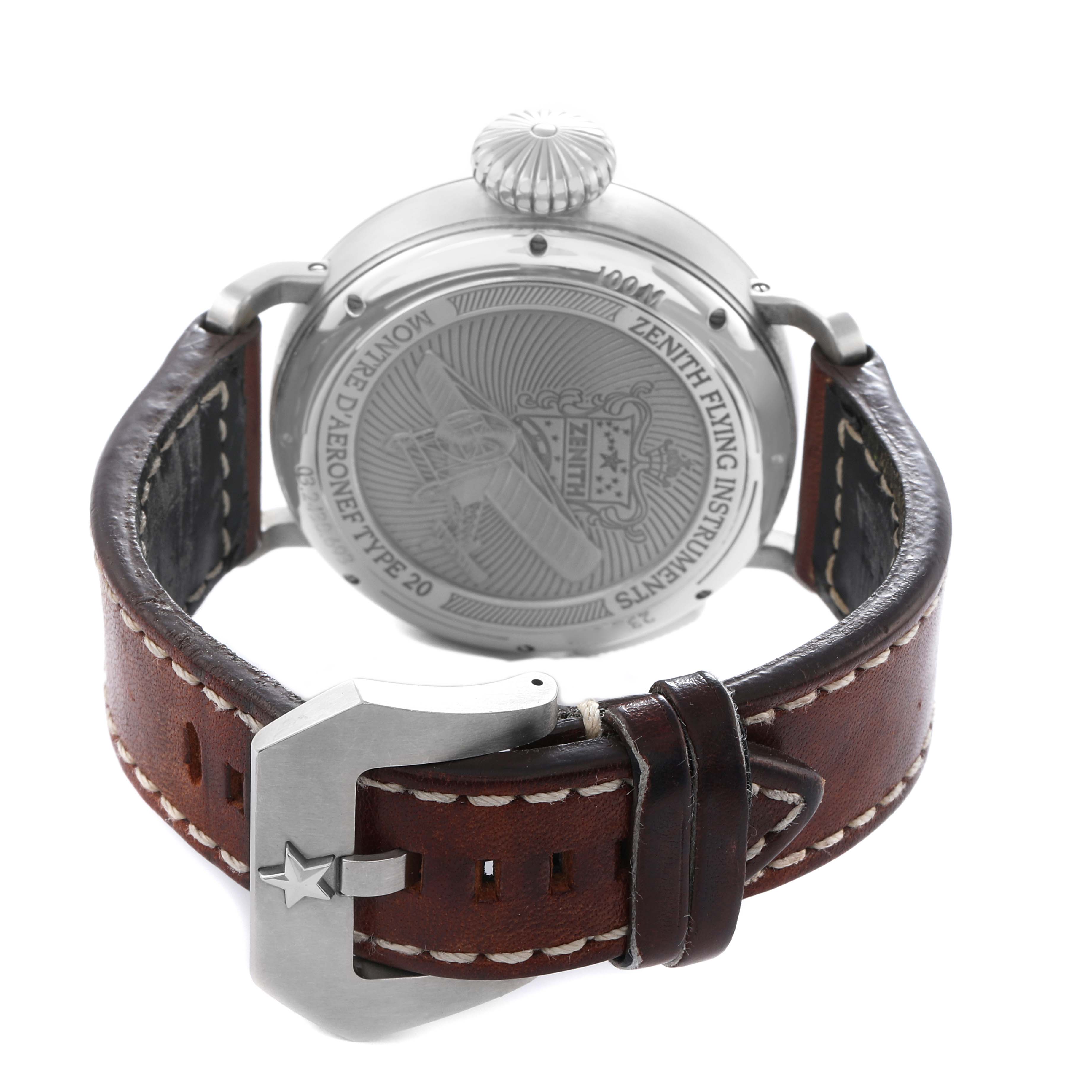 The image shows the back of the Zenith Pilot 03.2430.693 Men
s Stainless Steel Black Dial watch and its brown leather strap with a star-embellished clasp.