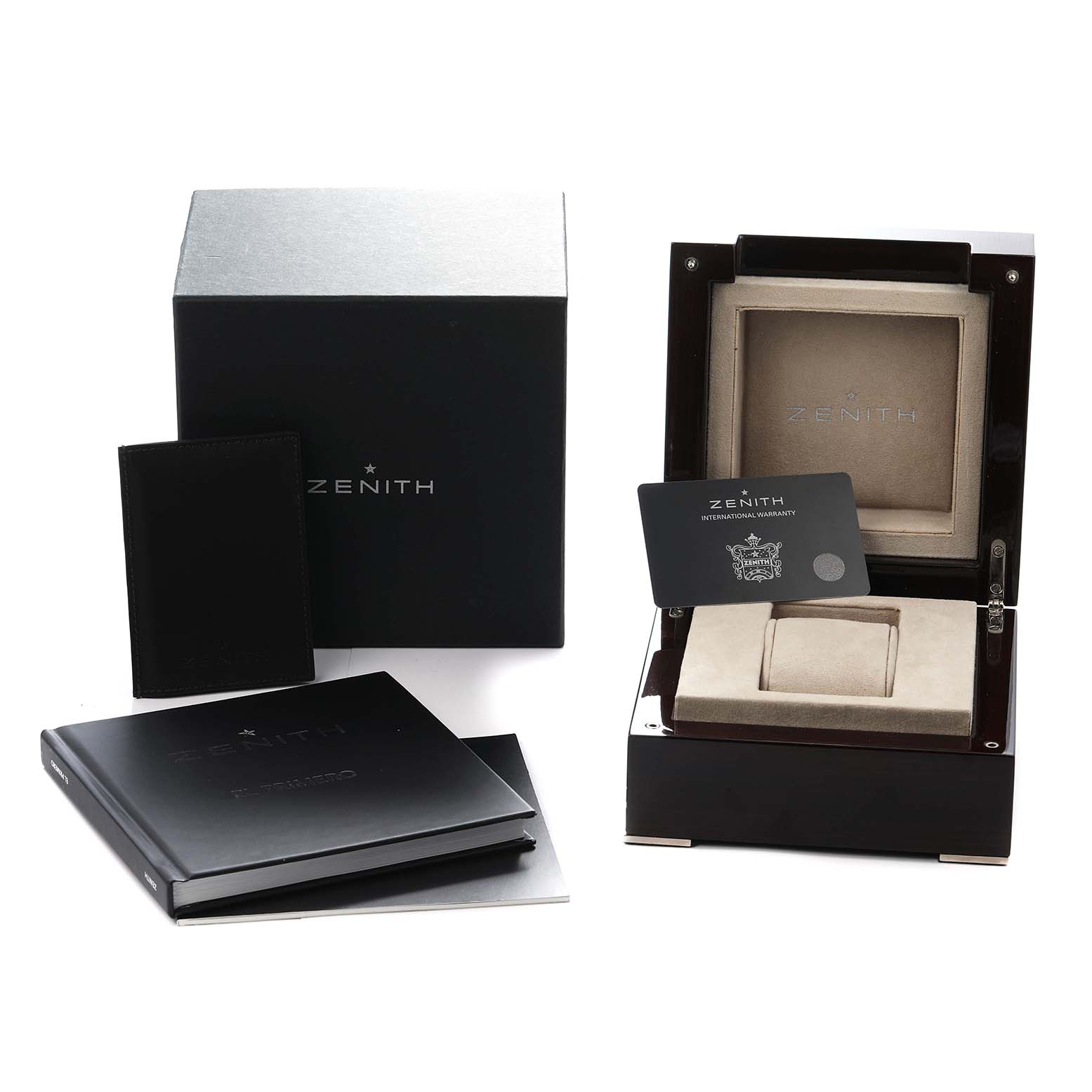 The image shows the box, booklet, warranty card, and case for the Zenith Pilot 03.2430.693 Men
s Stainless Steel Black Dial watch from a front angle.