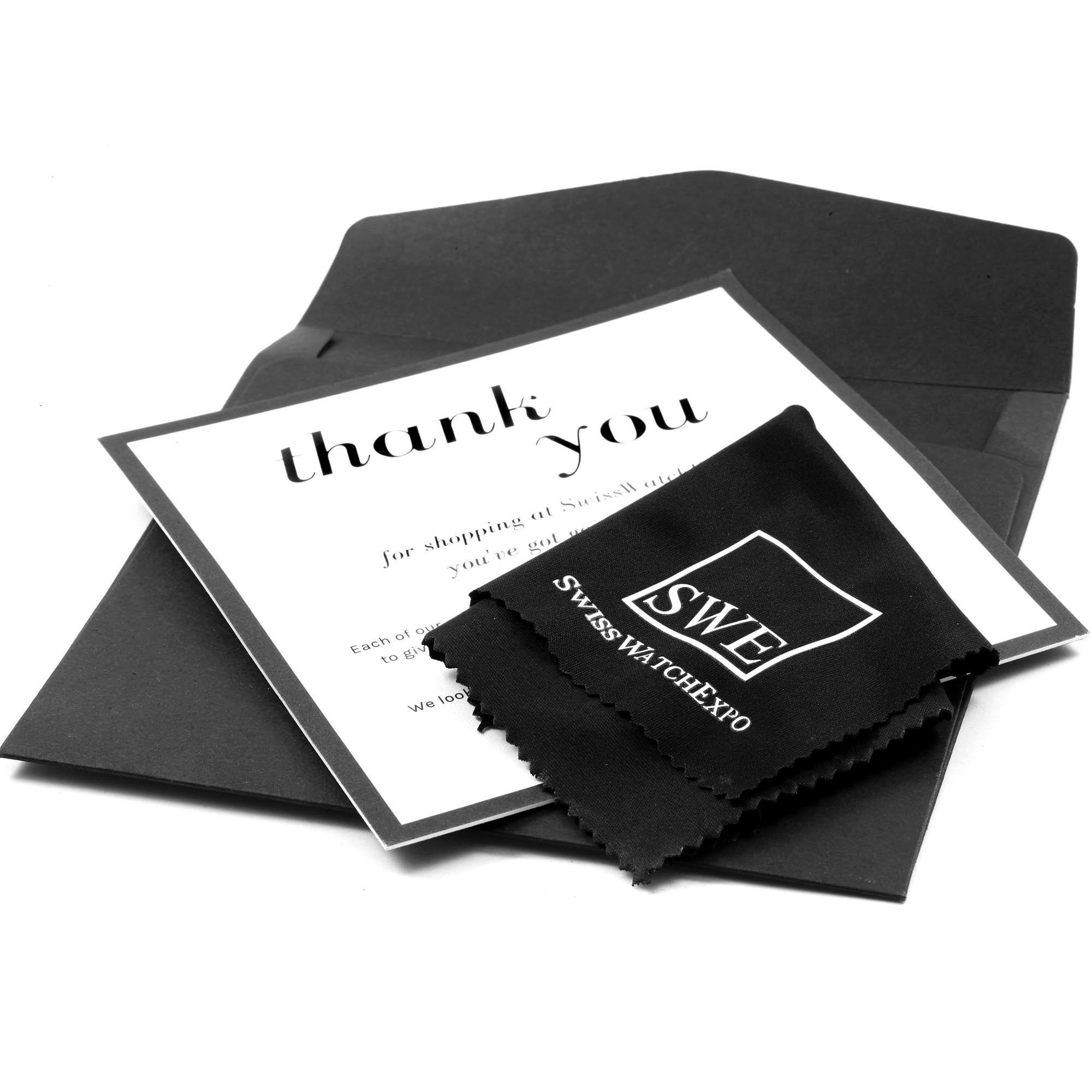 The image shows accessories for the Rolex Air-King Men's  Men's , including a thank you card and a cleaning cloth.