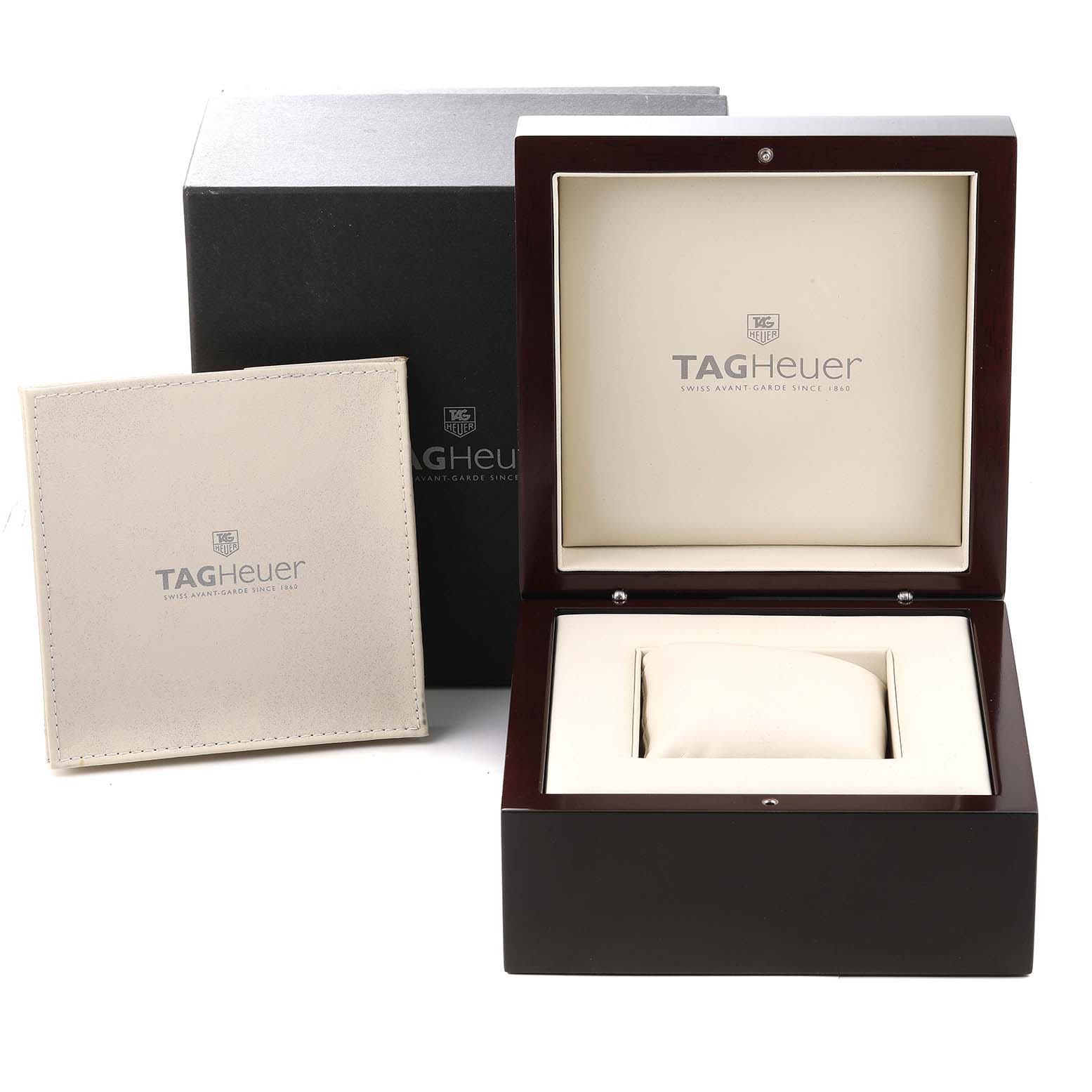 The image shows the packaging for a Tag Heuer Carrera CBM2112 Men's Stainless Steel Blue Dial CBM2112 Men's Stainless Steel Blue Dial watch, including a black outer box, a wooden display box, and a manual.