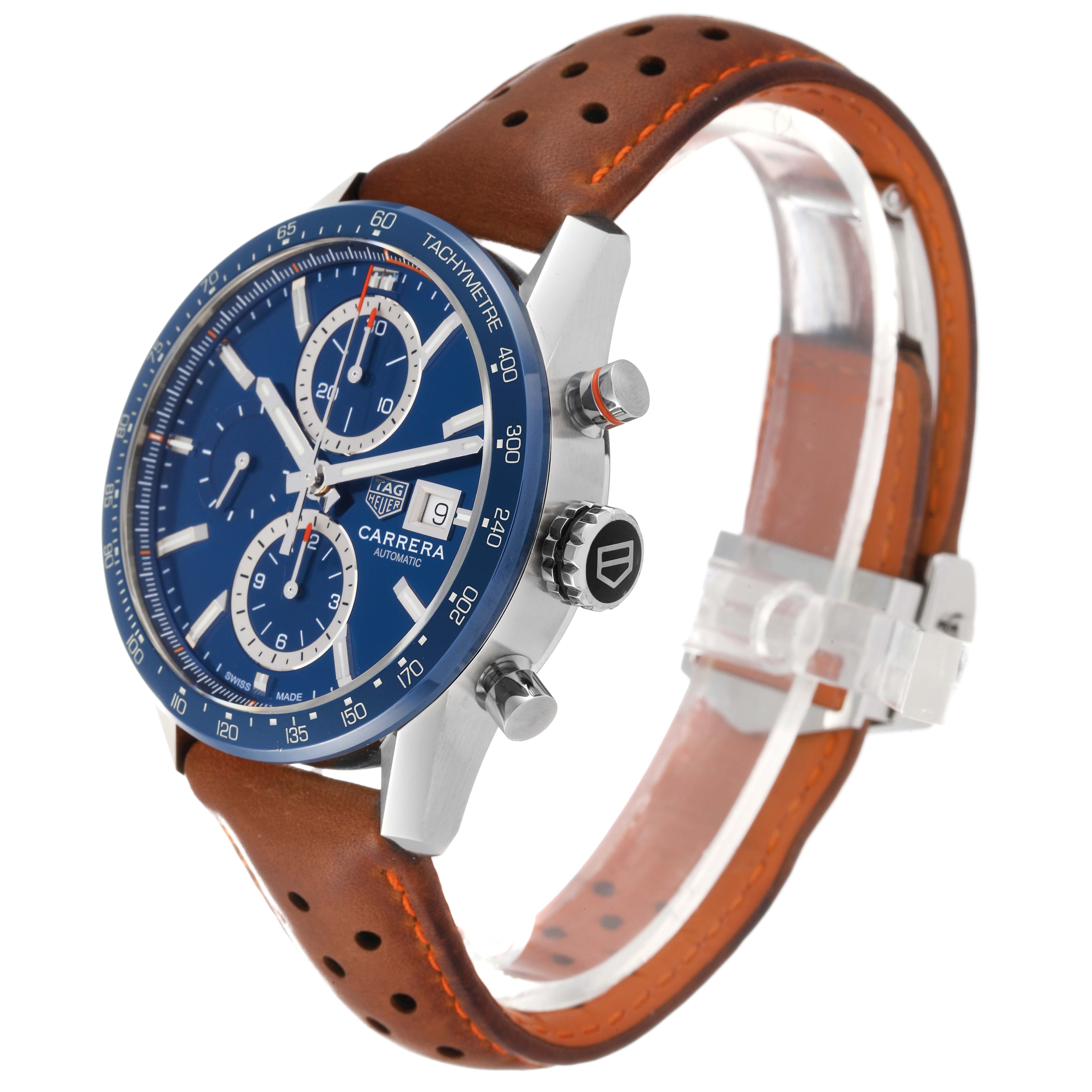 This image shows a side angle of the Tag Heuer Carrera CBM2112 Men's Stainless Steel Blue Dial CBM2112 Men's Stainless Steel Blue Dial watch, highlighting its blue dial, brown leather strap, and chronograph subdials.
