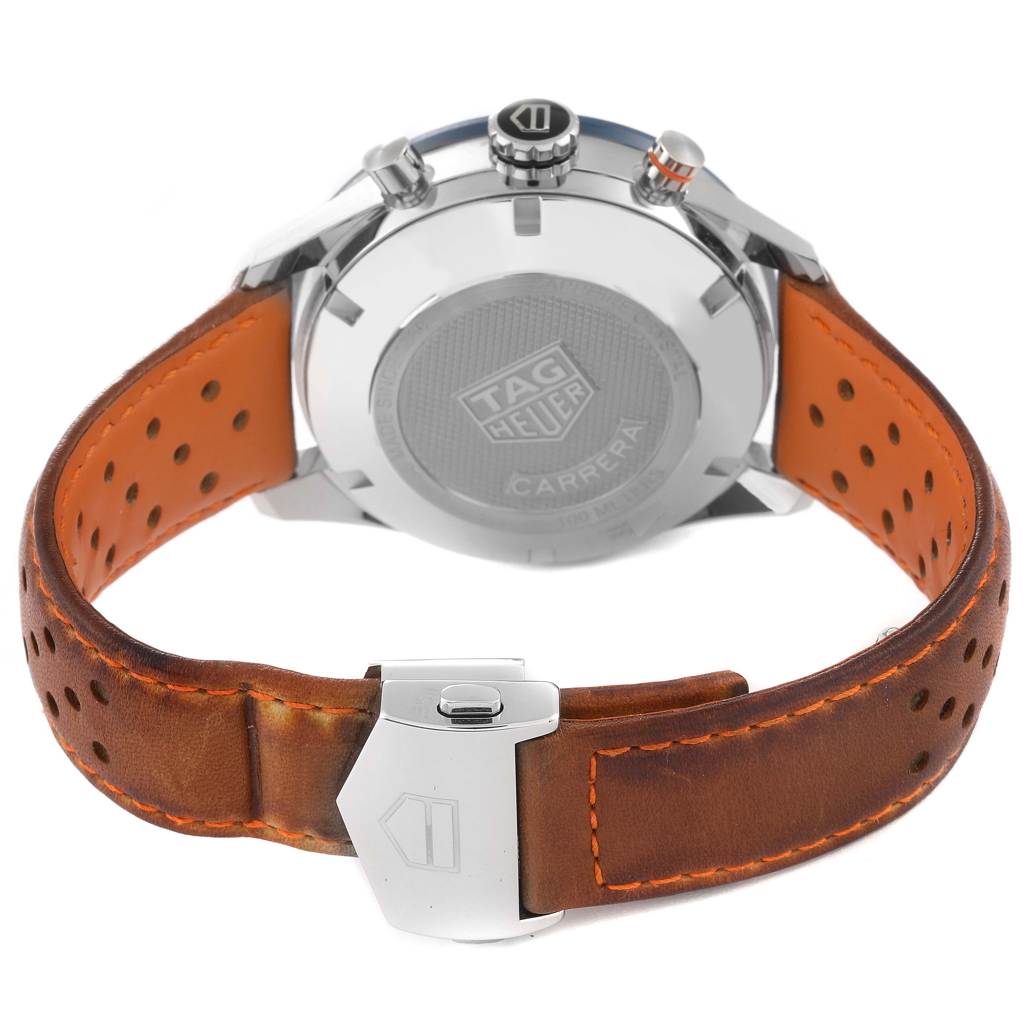 The image shows the back of a Tag Heuer Carrera CBM2112 Men's Stainless Steel Blue Dial CBM2112 Men's Stainless Steel Blue Dial model watch, focusing on the caseback, crown, pushers, and leather strap with buckle.