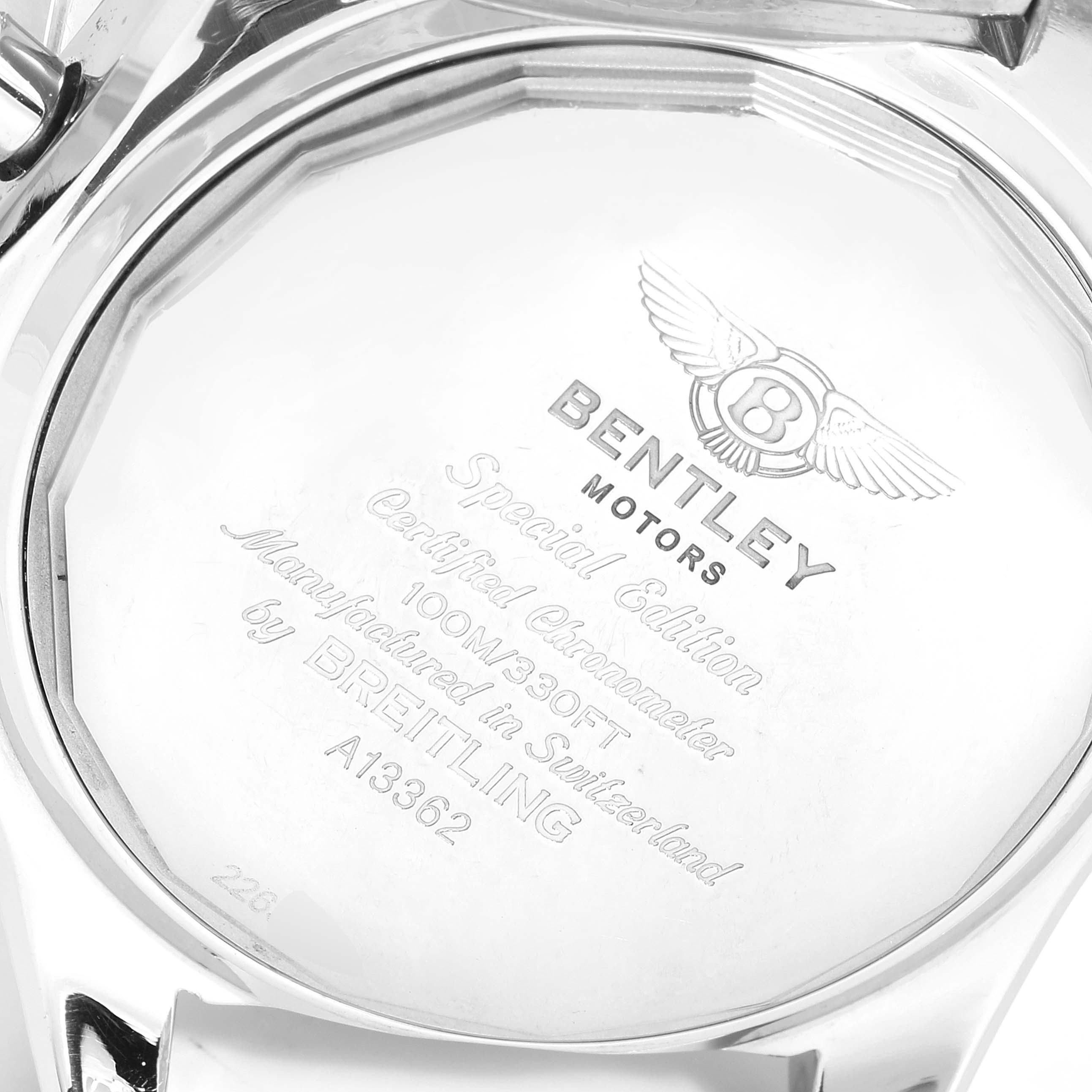 The image shows the back of a Bentley model watch by Breitling, highlighting its engravings and markings.