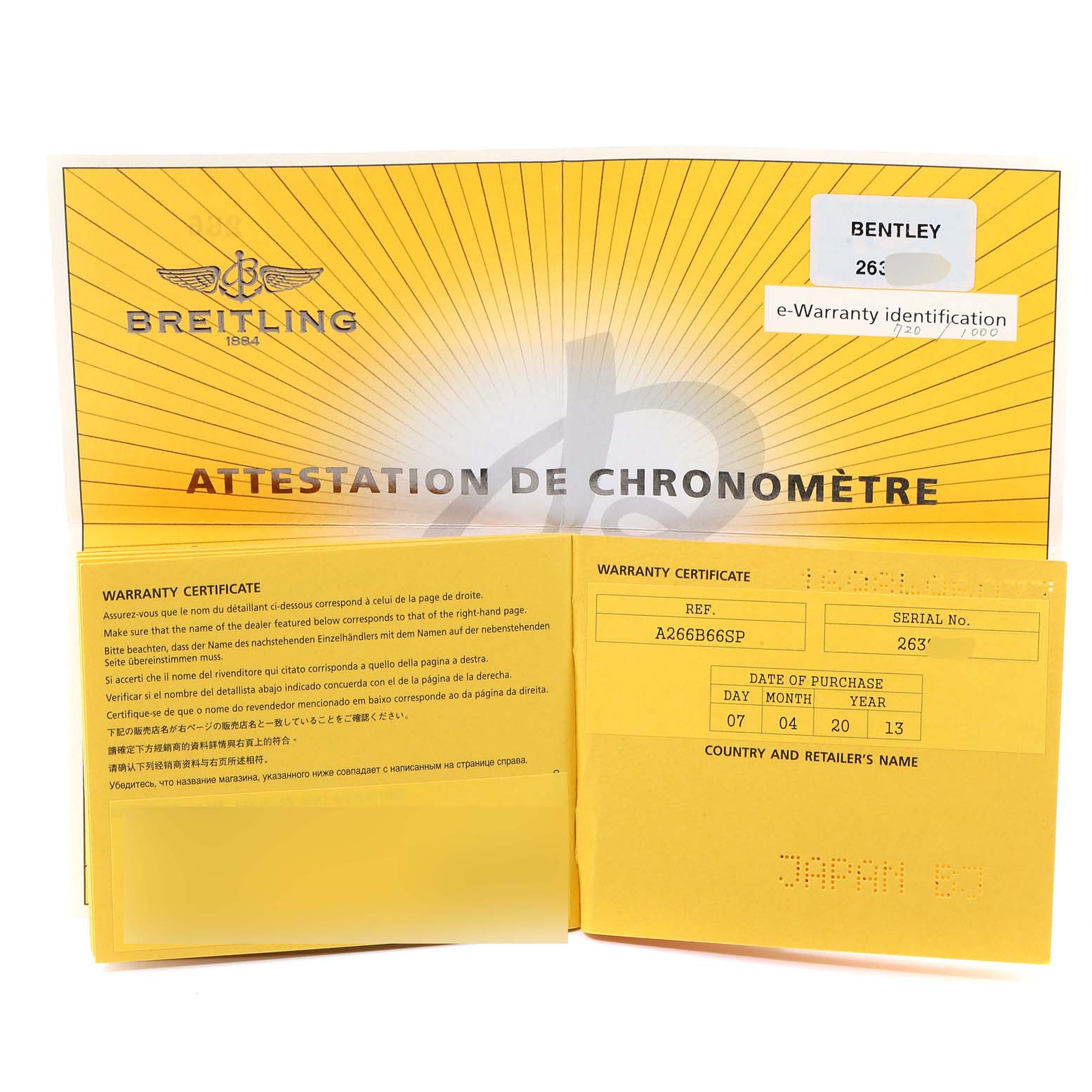 This image shows the warranty certificate and chronometer attestation for a Bentley model by Breitling.