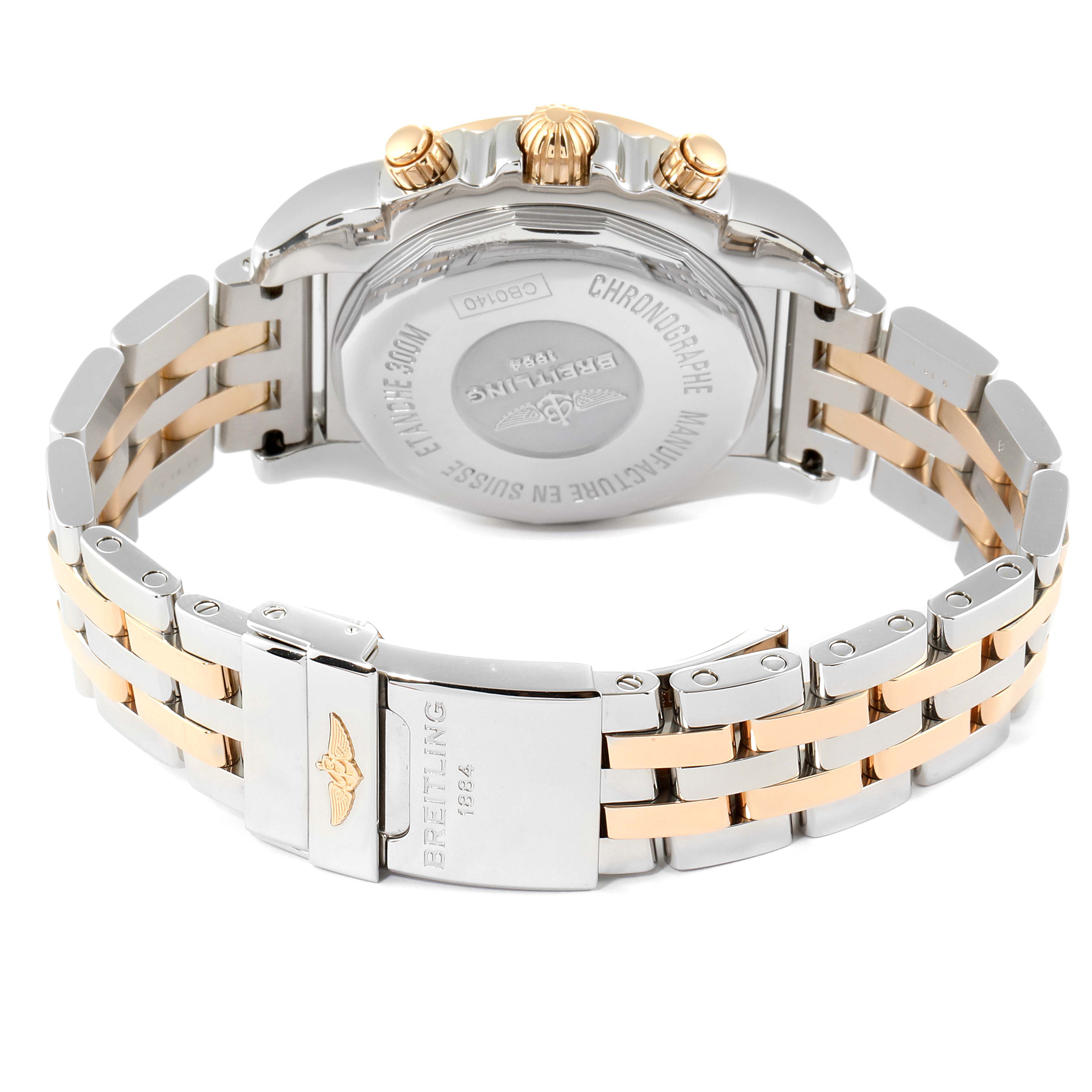 The image shows the back view of a Breitling Chronomat CB0140Y2/A743-378C Men's Steel and Gold (two tone) Silver Dial CB0140Y2/A743-378C Men's Steel and Gold (two tone) Silver Dial watch, highlighting its case back and two-tone bracelet.