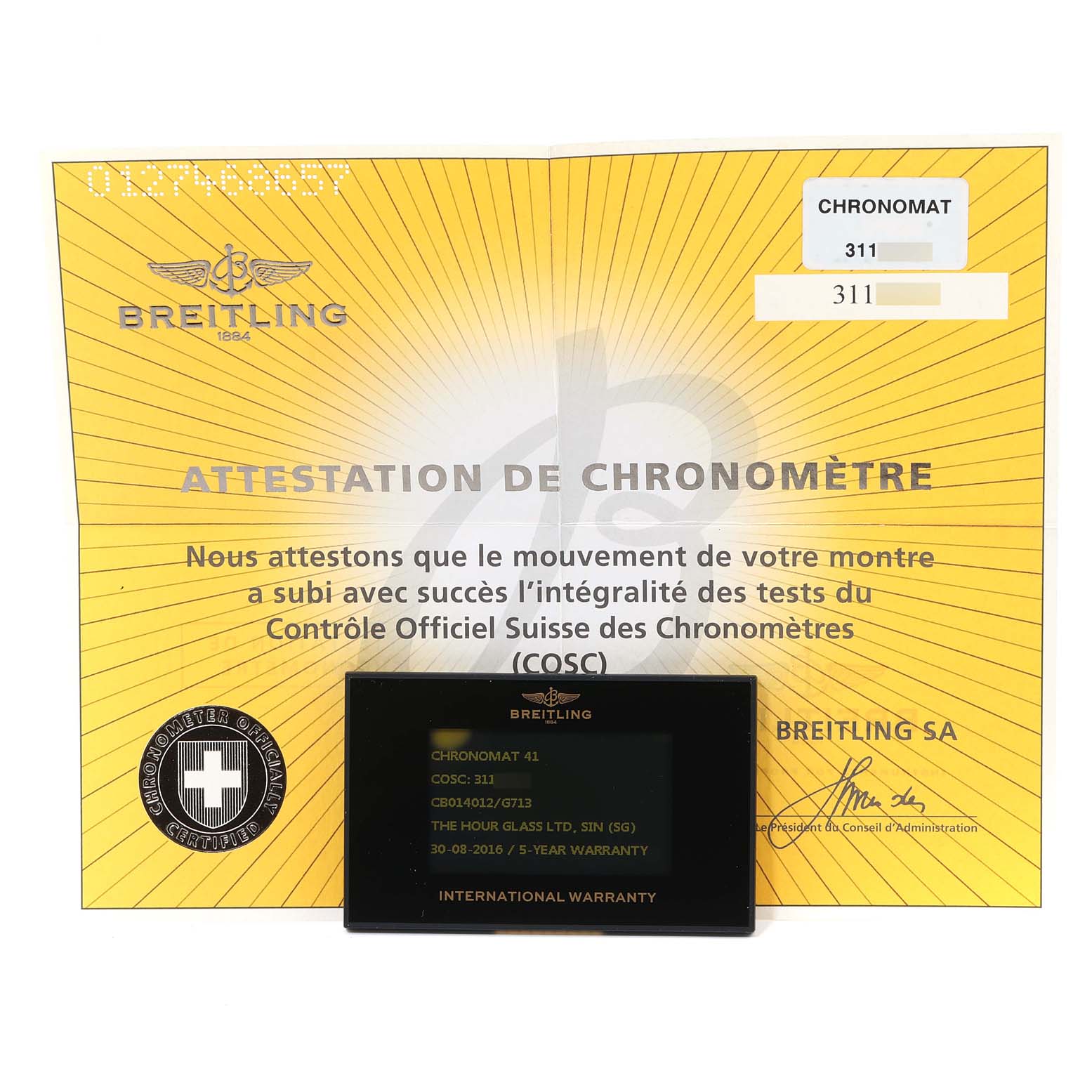 The image shows a Breitling Chronomat CB0140Y2/A743-378C Men's Steel and Gold (two tone) Silver Dial CB0140Y2/A743-378C Men's Steel and Gold (two tone) Silver Dial model attestation certificate and an international warranty card.