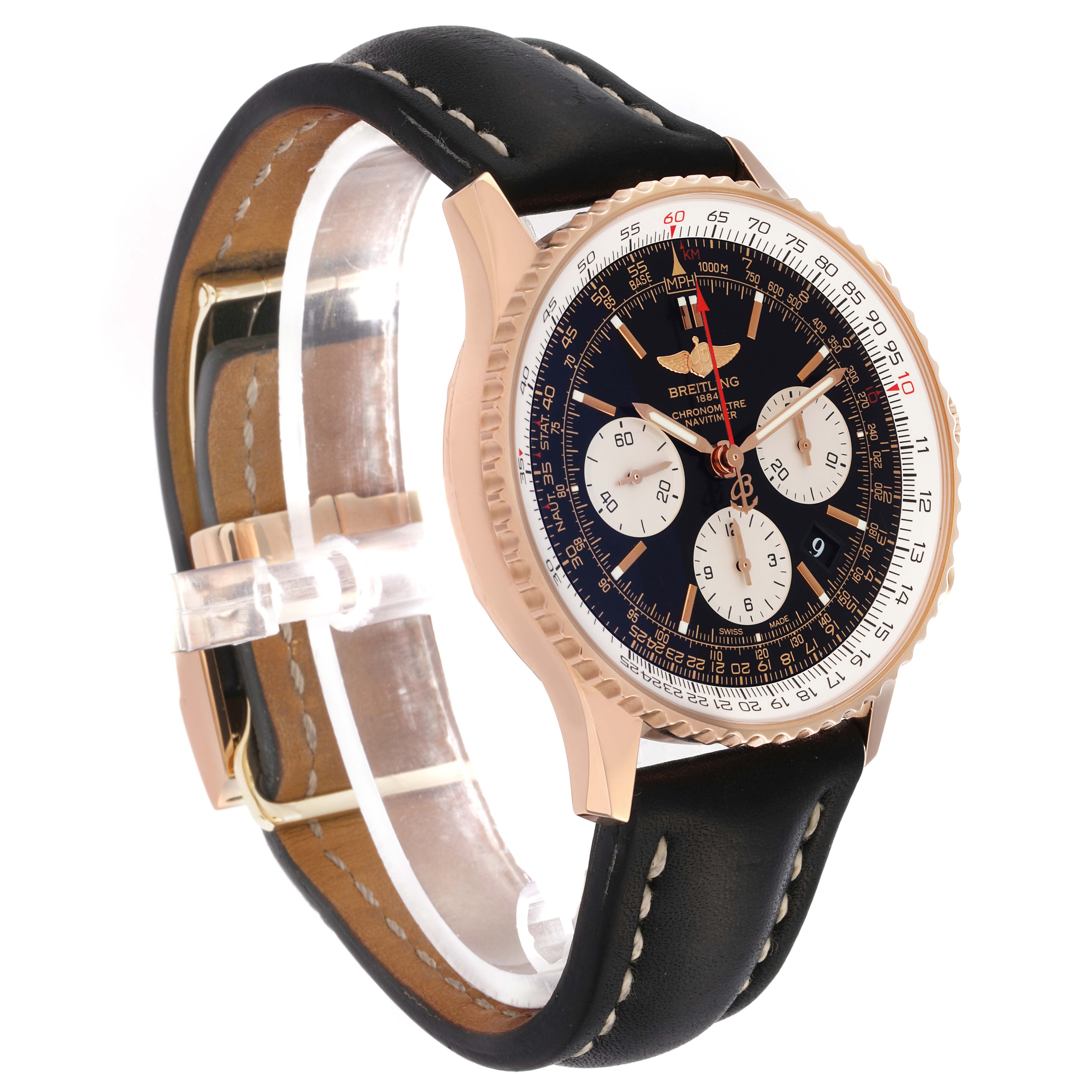 This Breitling Navitimer RB0120 Men
s Rose Gold Black Dial watch is shown at an angled view, displaying the face, bezel, and leather strap with a clasp.