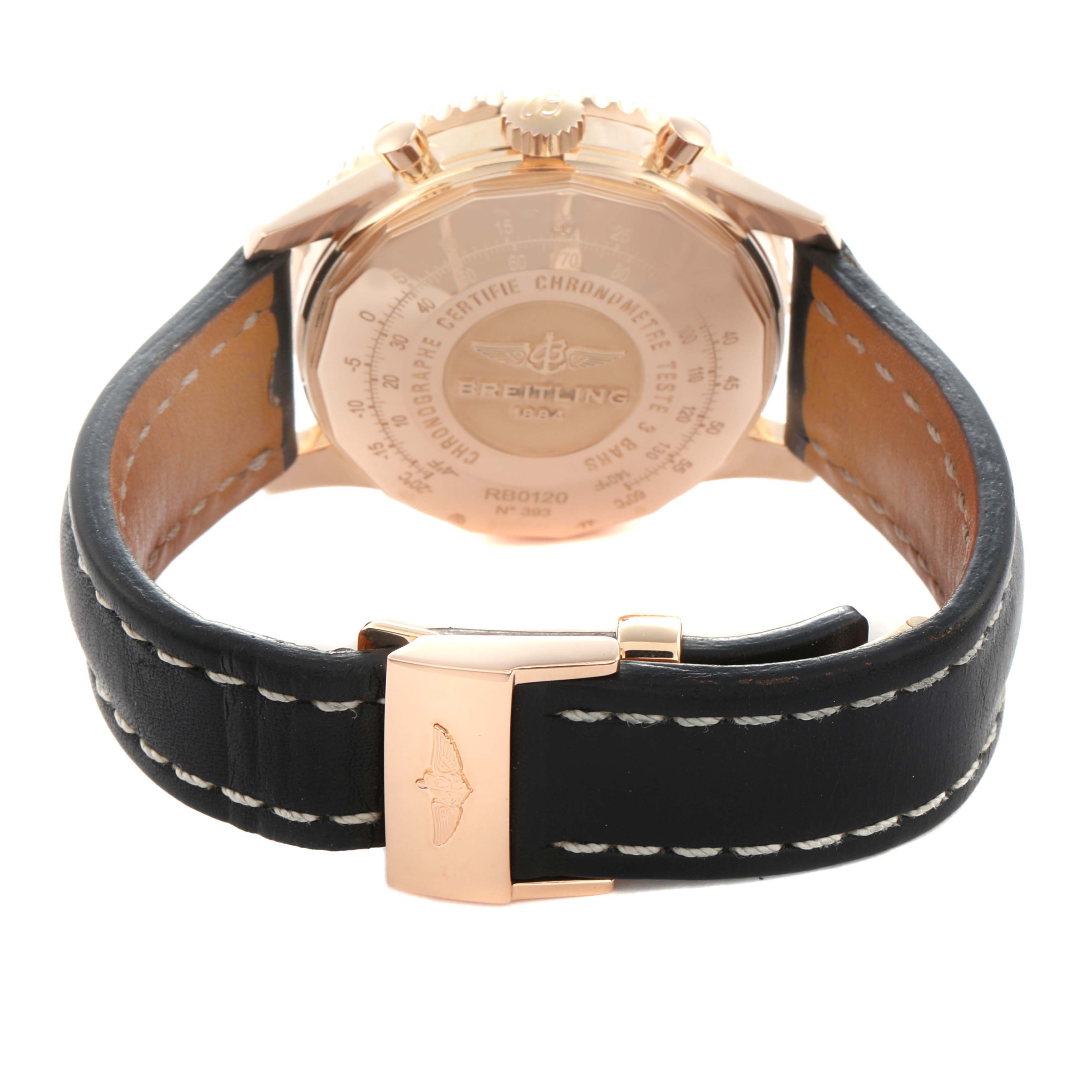 The image shows the back and clasp of a Breitling Navitimer RB0120 Men
s Rose Gold Black Dial watch, highlighting the engraved case back and leather strap.