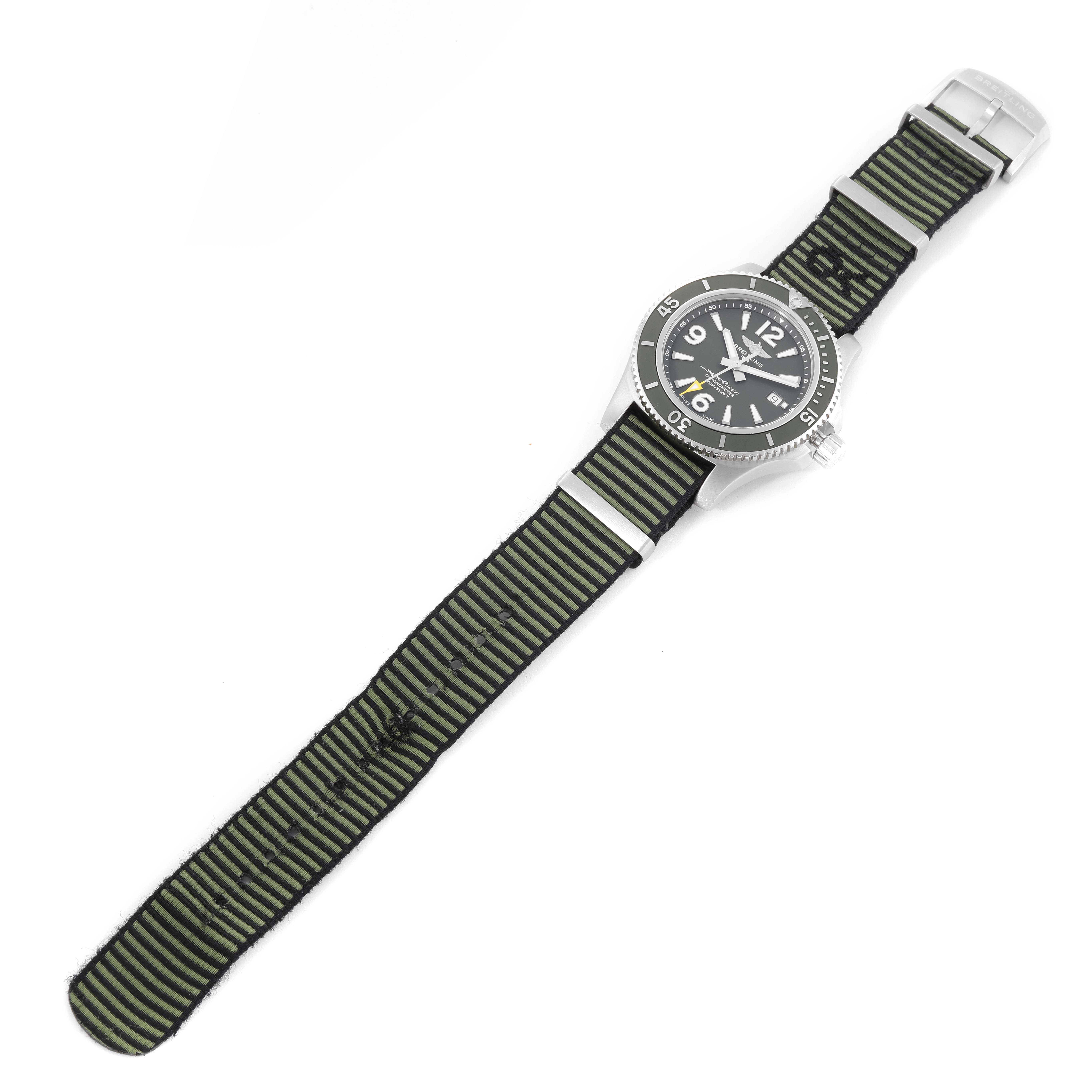 The Breitling Superocean A17367 Men's Stainless Steel Green Dial A17367 Men's Stainless Steel Green Dial watch is shown from the front with a striped fabric strap.
