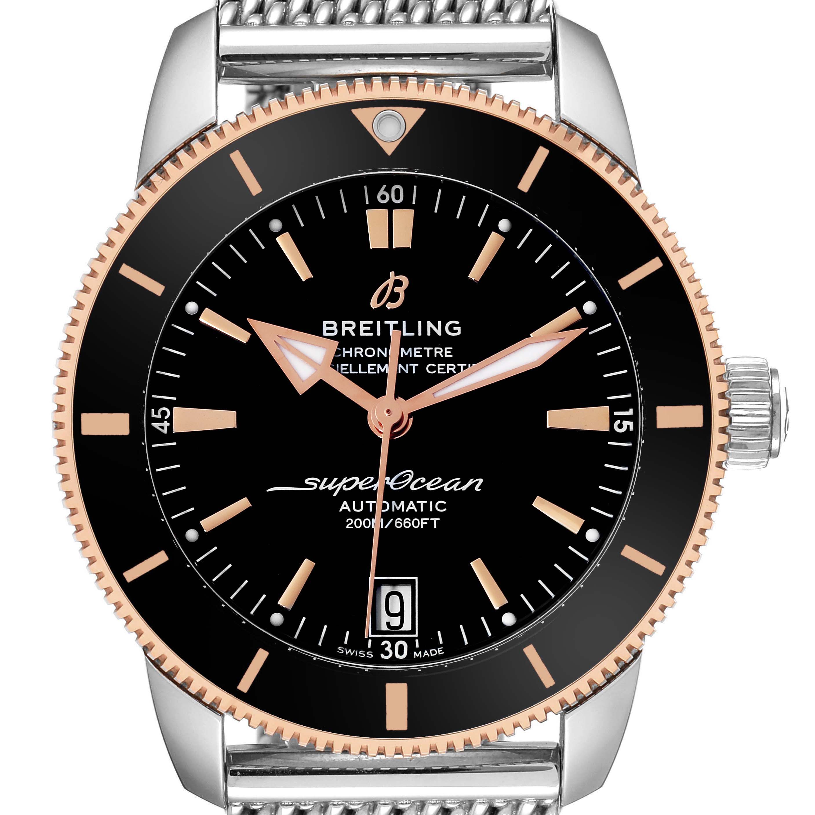The Breitling Superocean UB2010 Men's Steel and Gold (two tone) Black Dial UB2010 Men's Steel and Gold (two tone) Black Dial watch is shown from a front angle, highlighting its dial, bezel, and part of the strap.