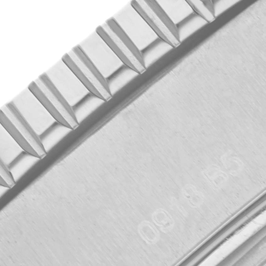 This close-up image shows the textured bezel and part of the case of the Breitling Superocean A17392 Men's Stainless Steel Black Dial A17392 Men's Stainless Steel Black Dial watch.